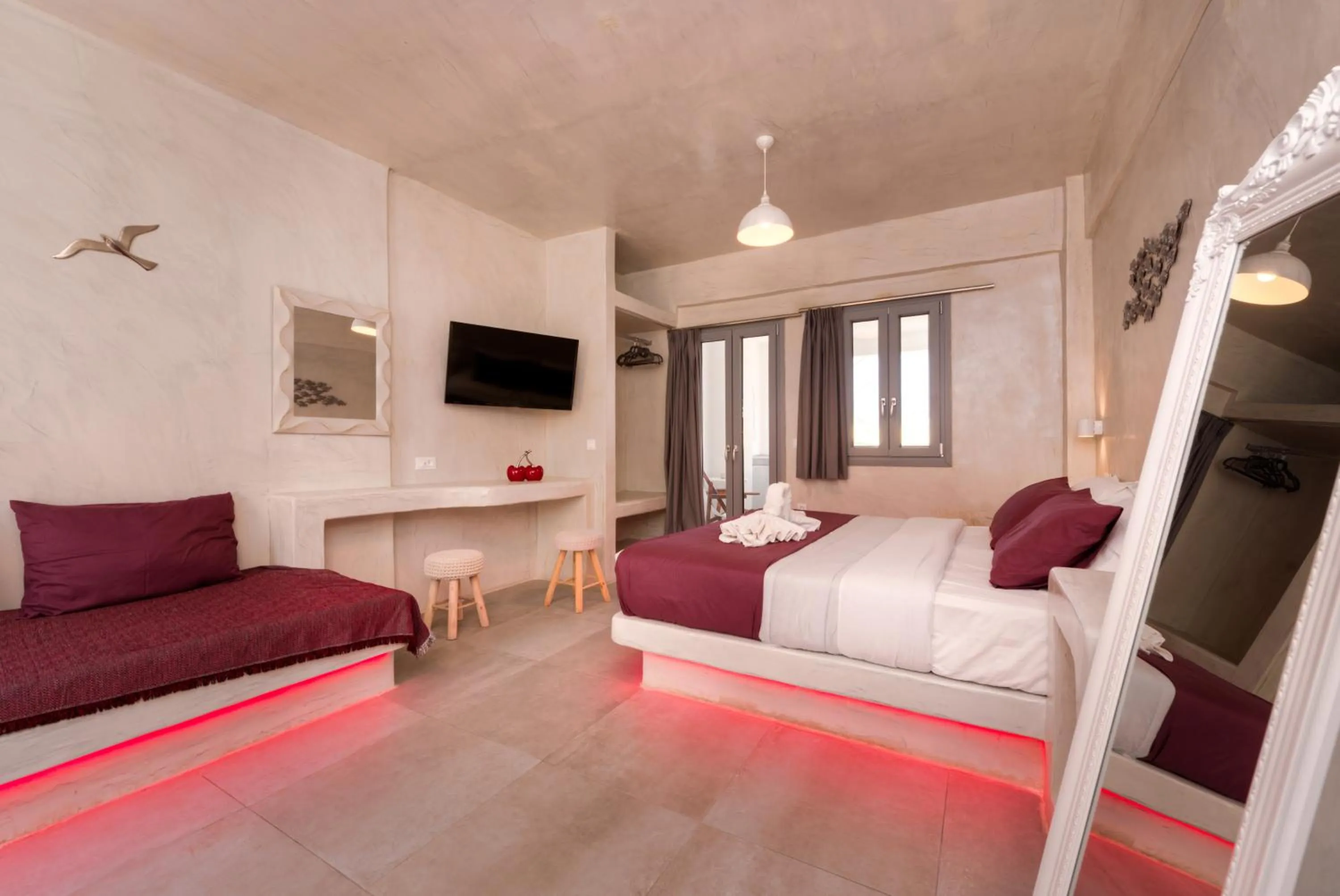 Photo of the whole room, Bed in The Muses of Santorini Private Jacuzzi Suites