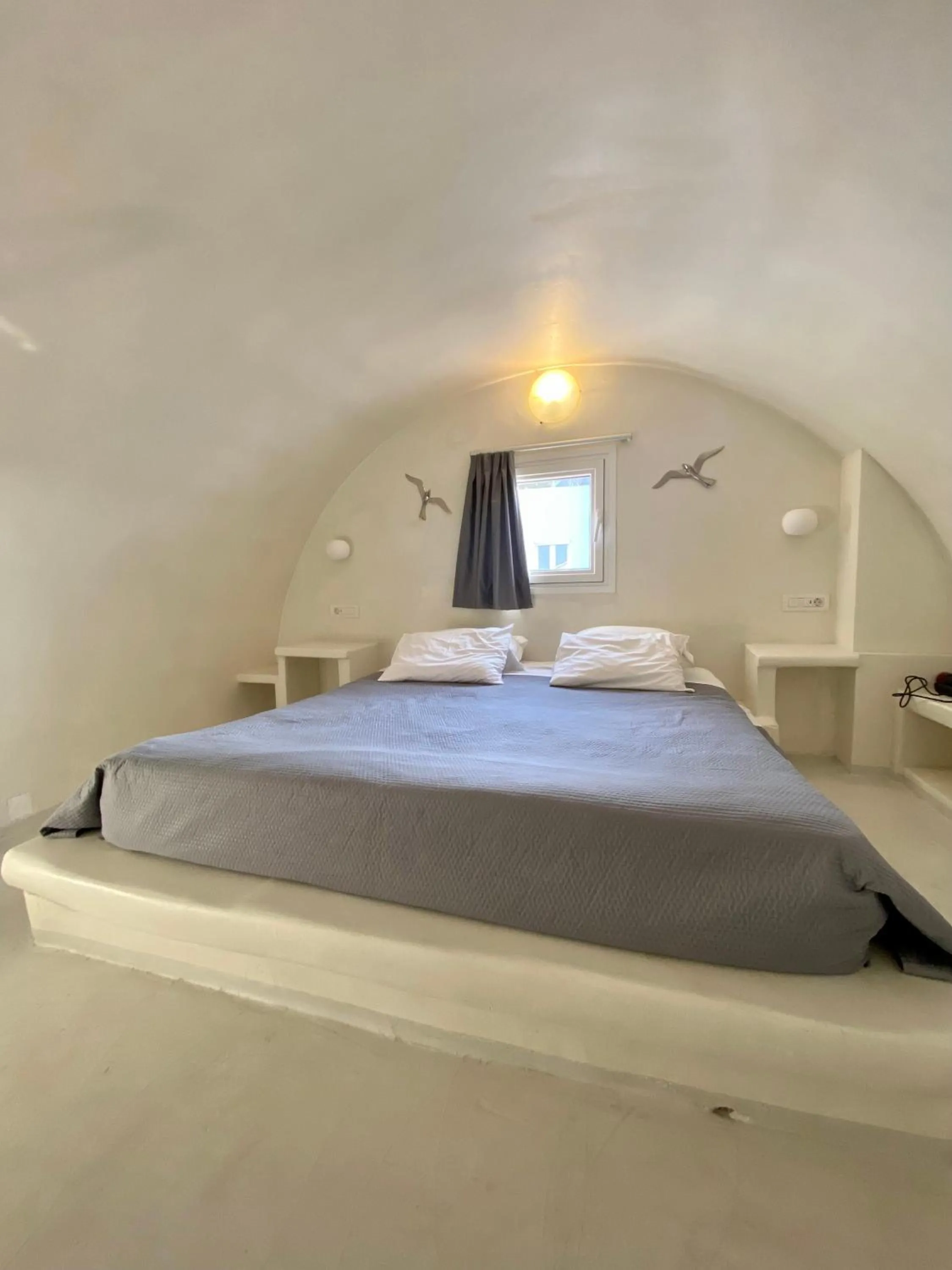 Bedroom, Bed in The Muses of Santorini Private Jacuzzi Suites