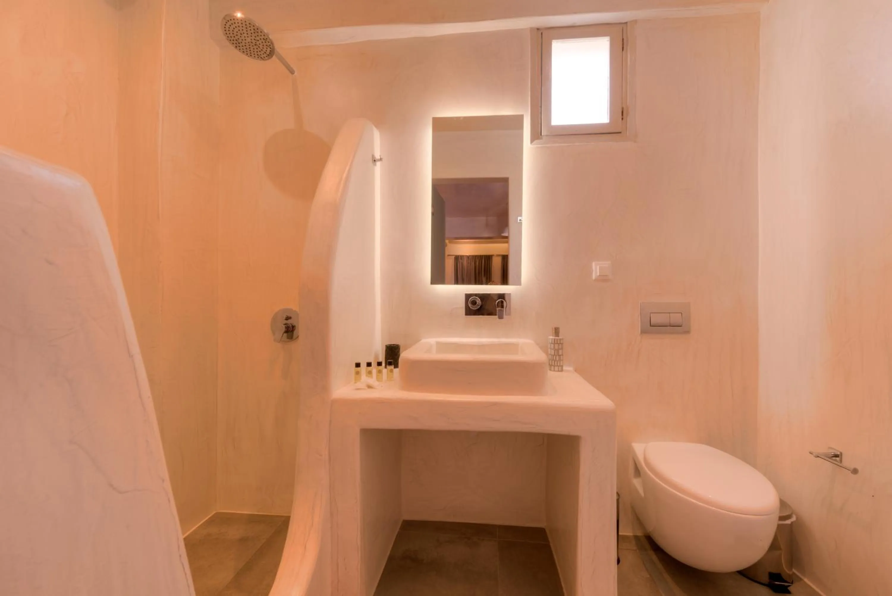 Bathroom in The Muses of Santorini Private Jacuzzi Suites