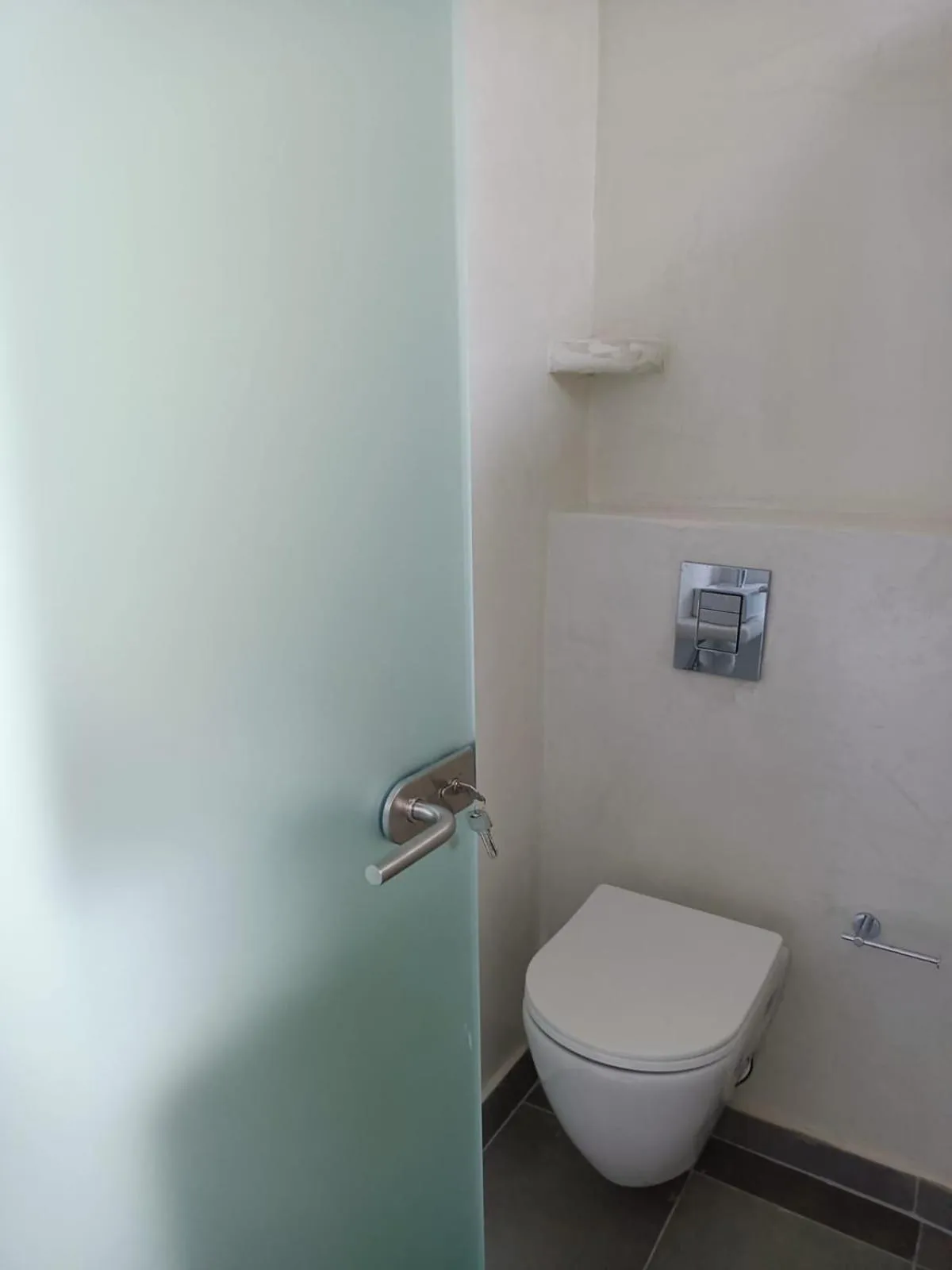 Toilet in The Muses of Santorini Private Jacuzzi Suites