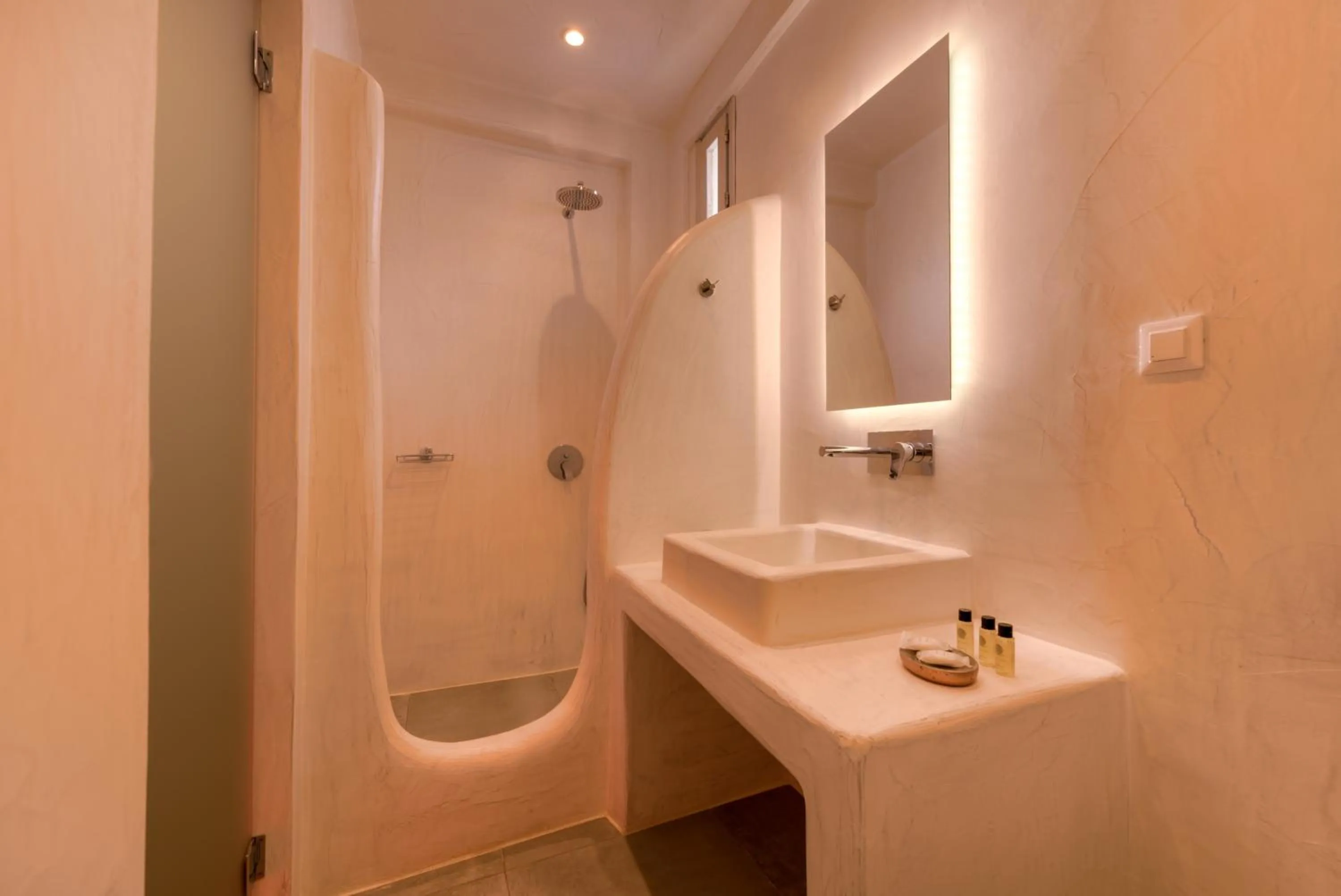 Bathroom in The Muses of Santorini Private Jacuzzi Suites