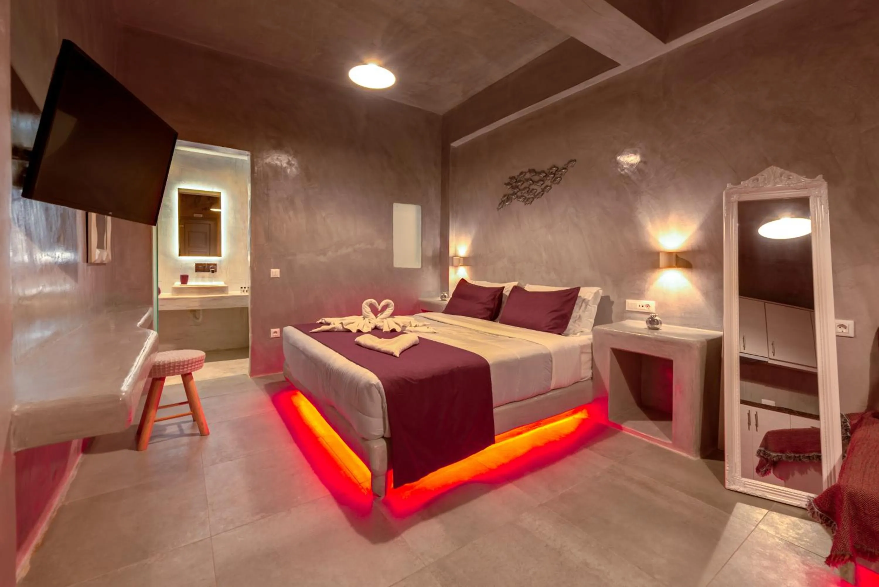 Photo of the whole room, Bed in The Muses of Santorini Private Jacuzzi Suites