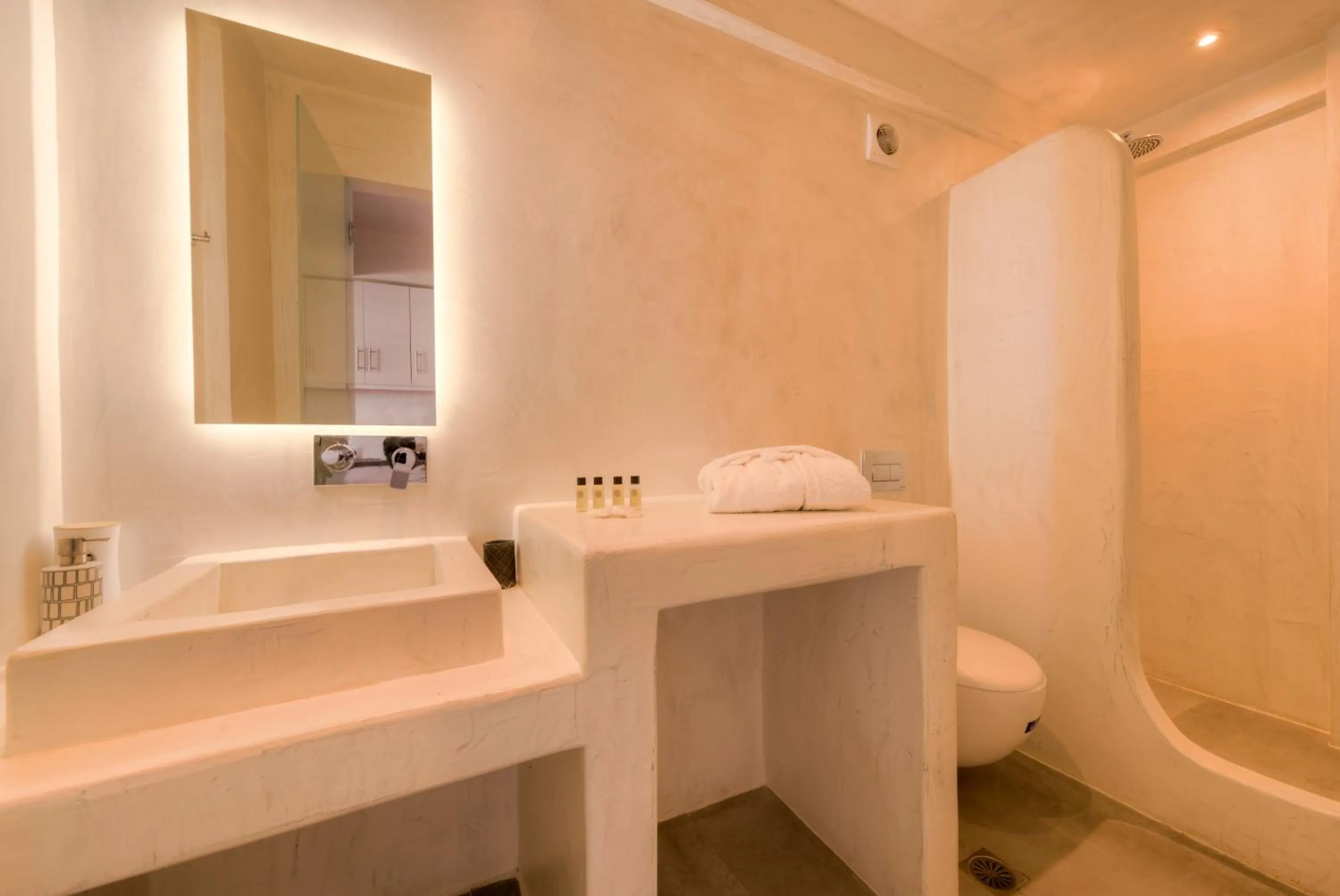 Bathroom in The Muses of Santorini Private Jacuzzi Suites