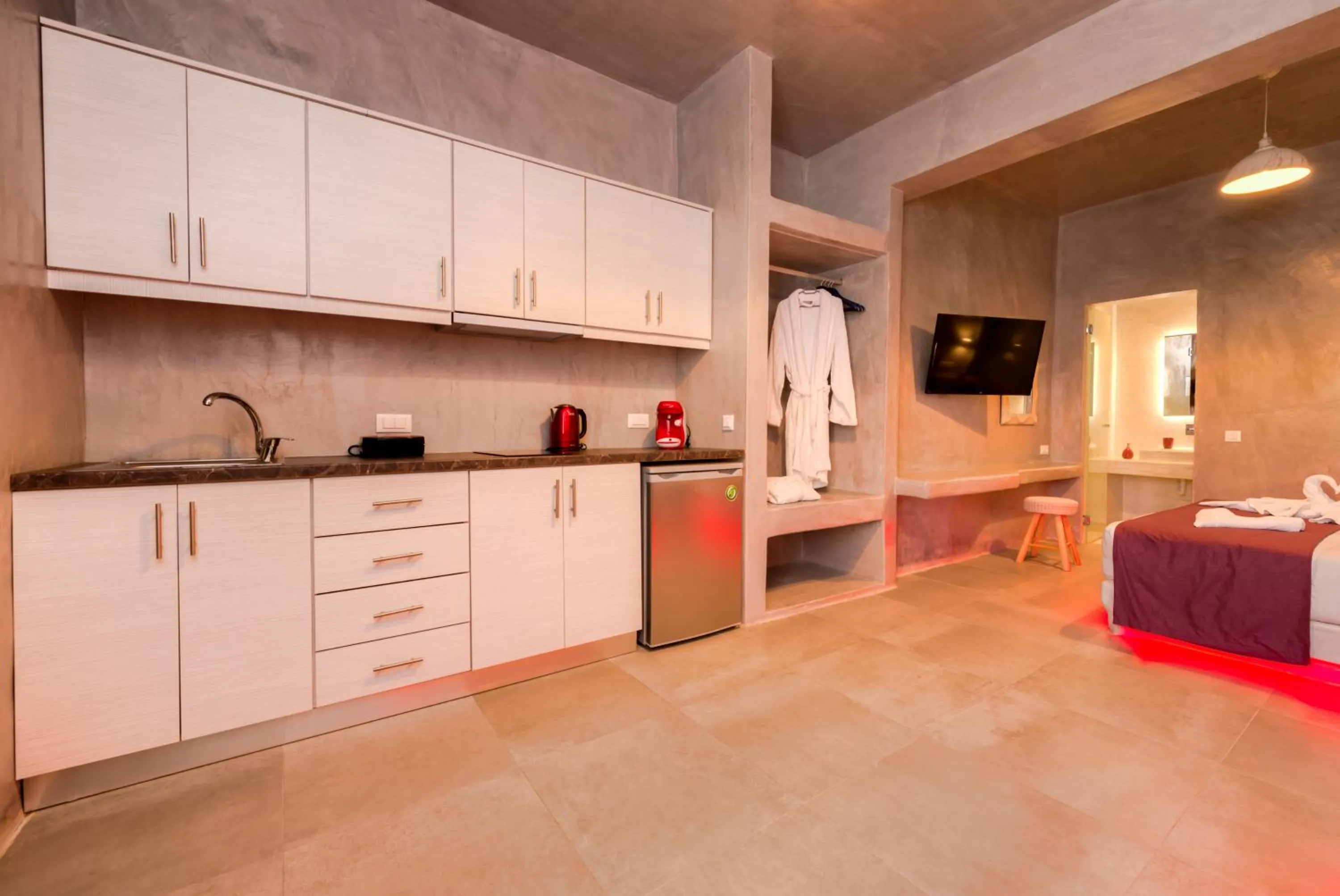 Kitchen or kitchenette in The Muses of Santorini Private Jacuzzi Suites