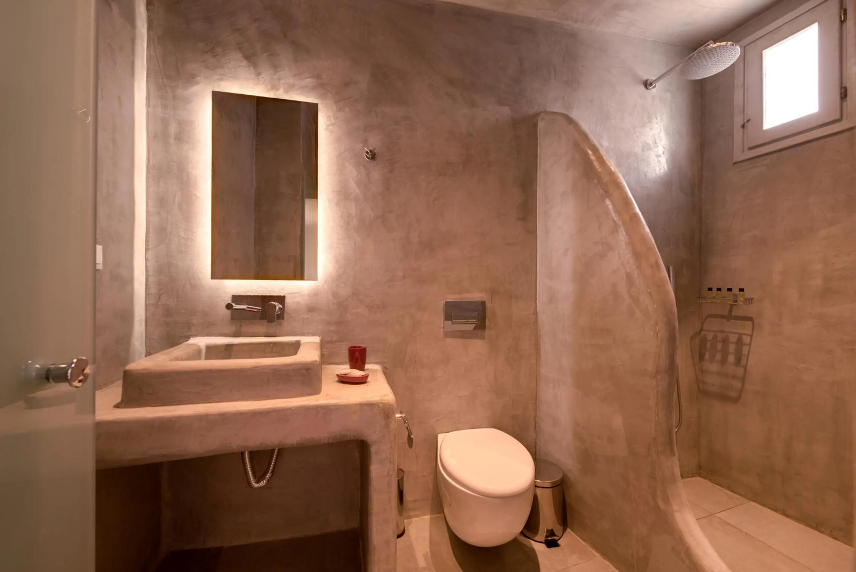 Bathroom in The Muses of Santorini Private Jacuzzi Suites