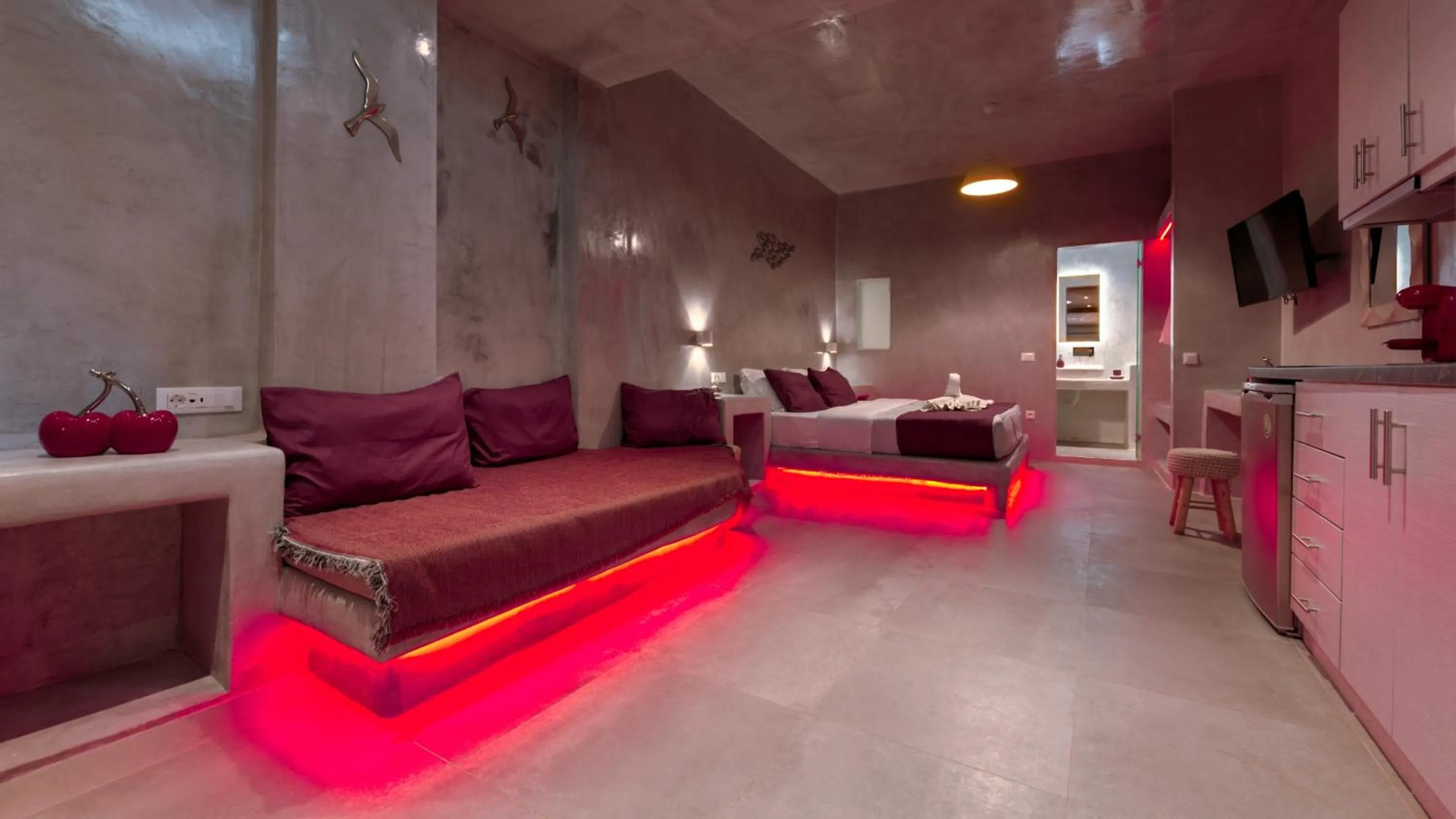 Seating area in The Muses of Santorini Private Jacuzzi Suites