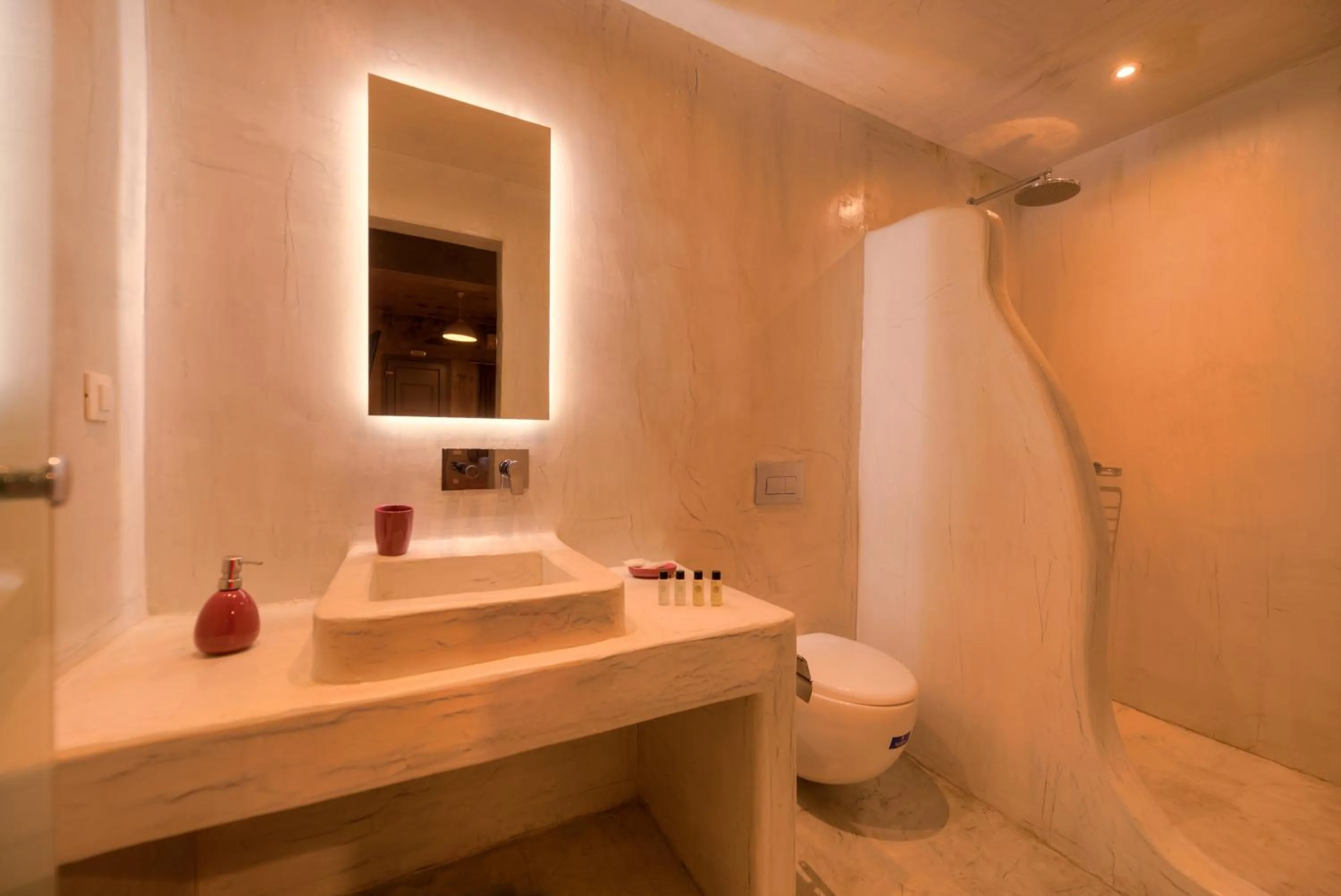 Bathroom in The Muses of Santorini Private Jacuzzi Suites