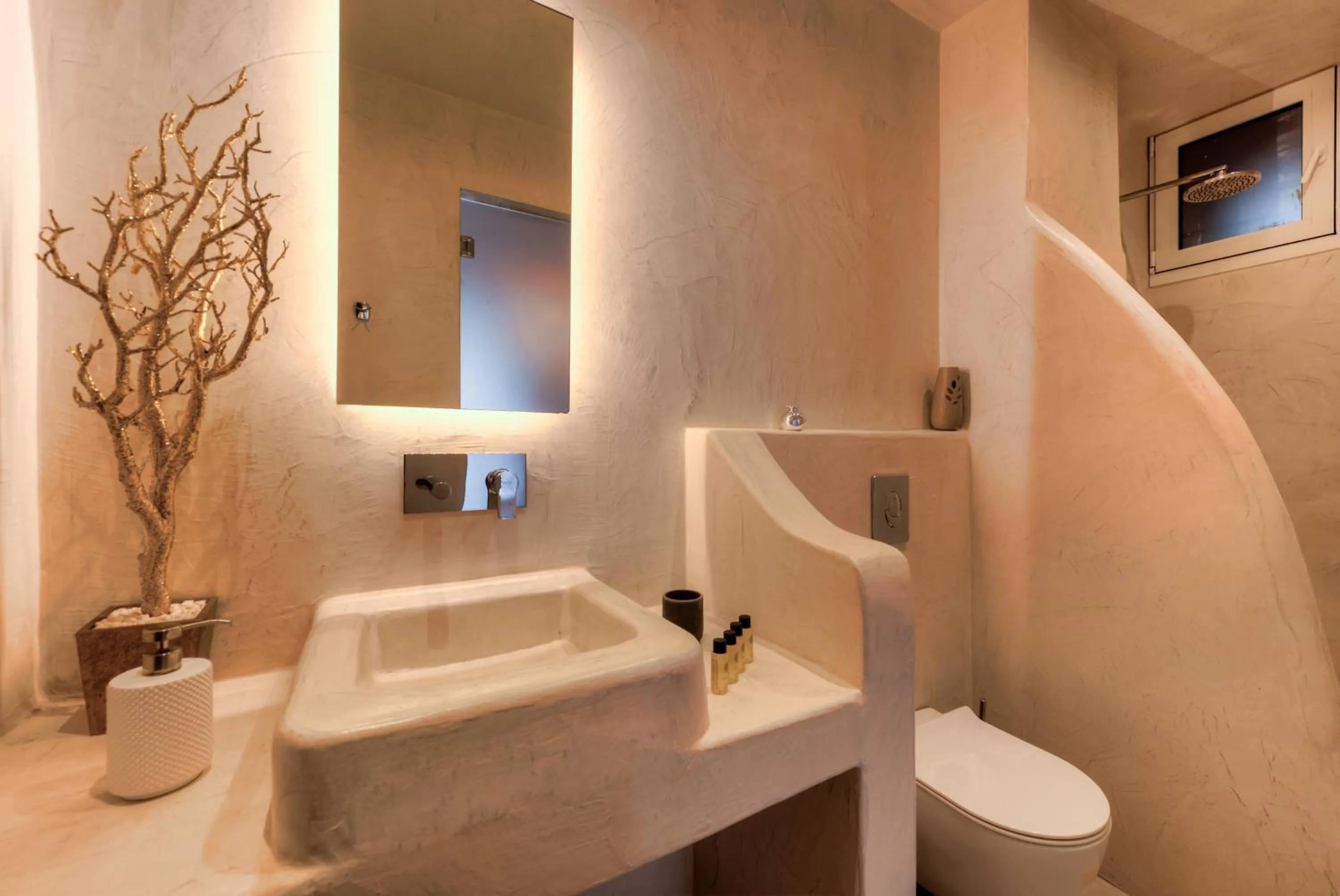 Bathroom in The Muses of Santorini Private Jacuzzi Suites