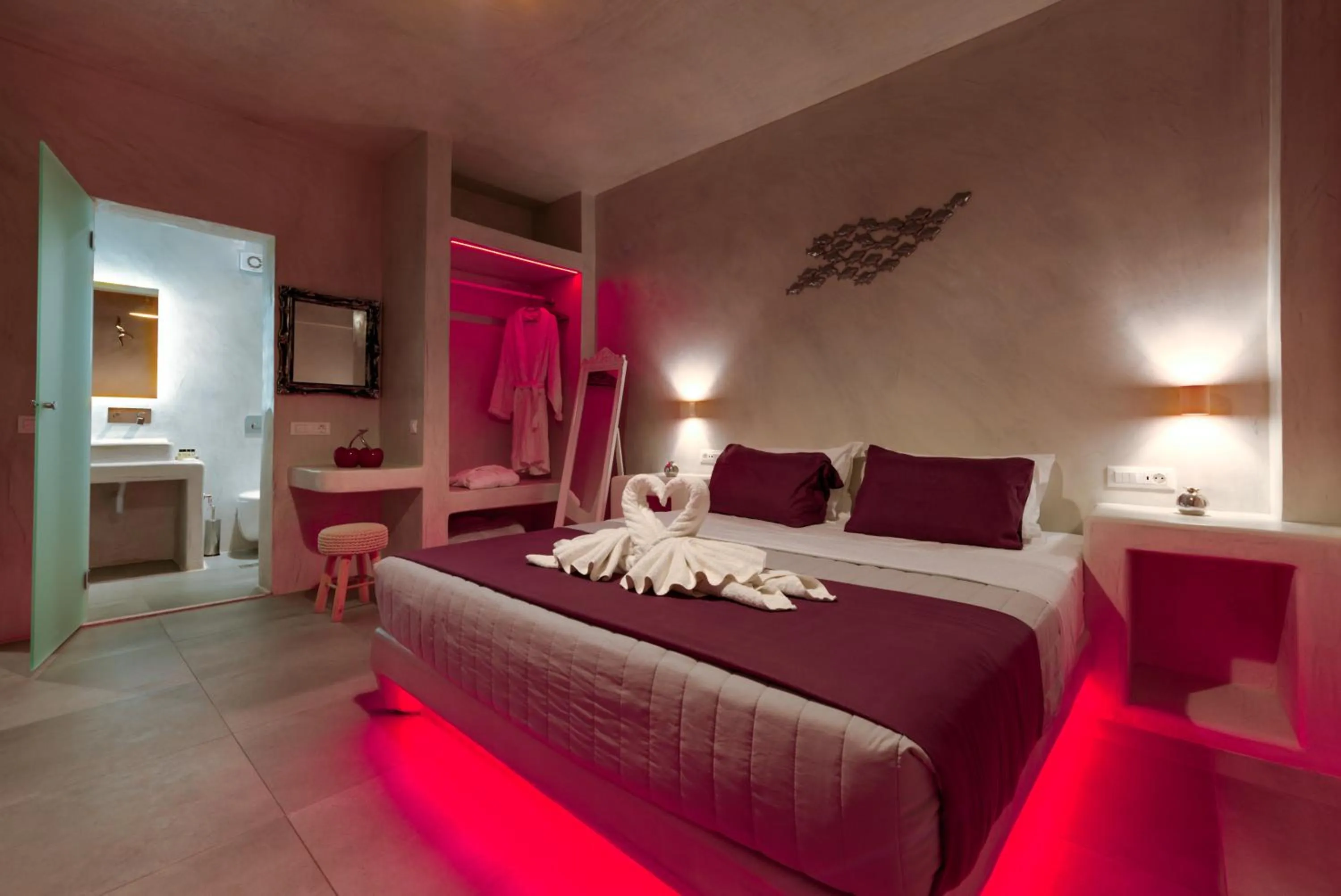 Photo of the whole room, Bed in The Muses of Santorini Private Jacuzzi Suites