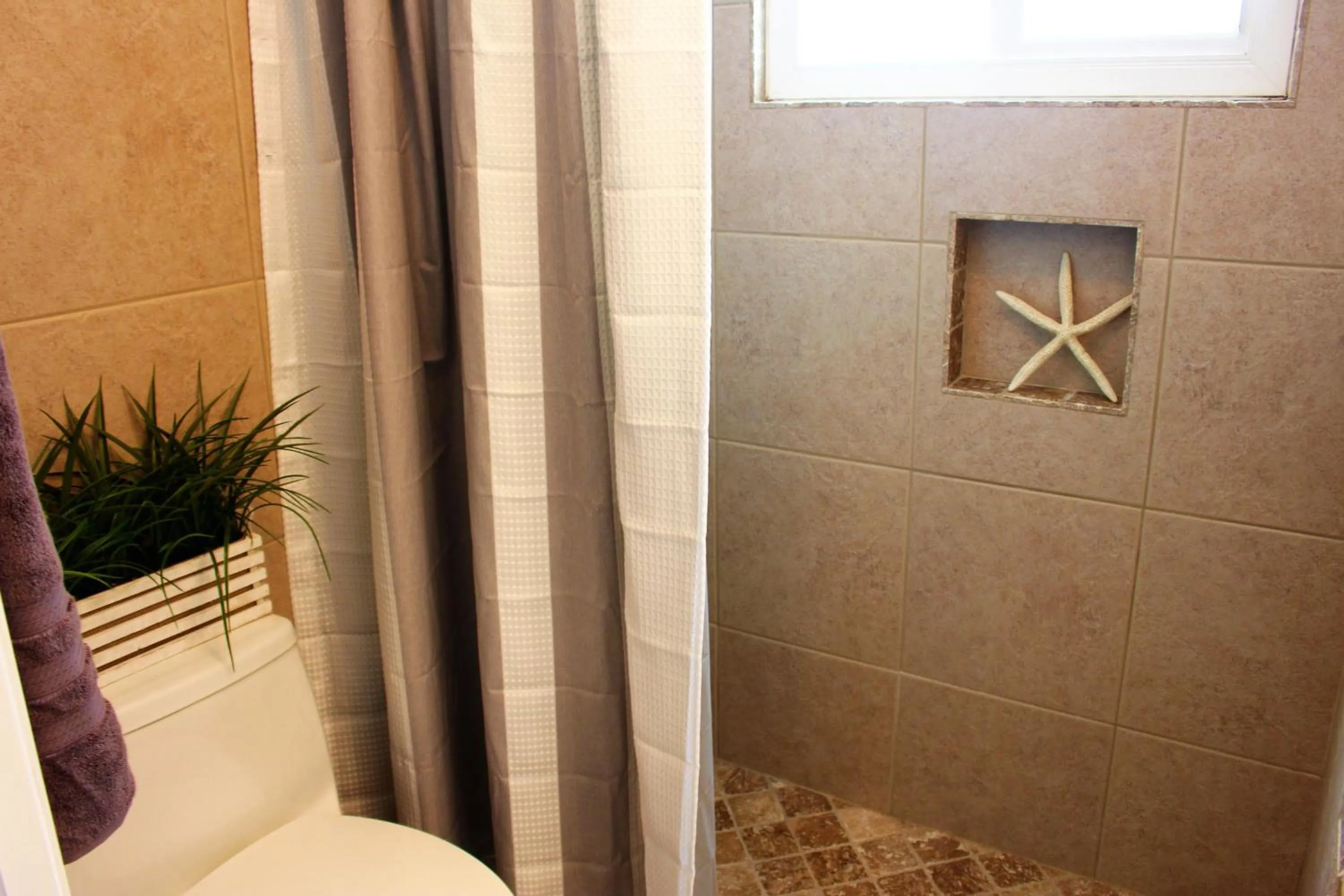 Shower in Latitude 26 Waterfront Boutique Resort - Bonita Springs