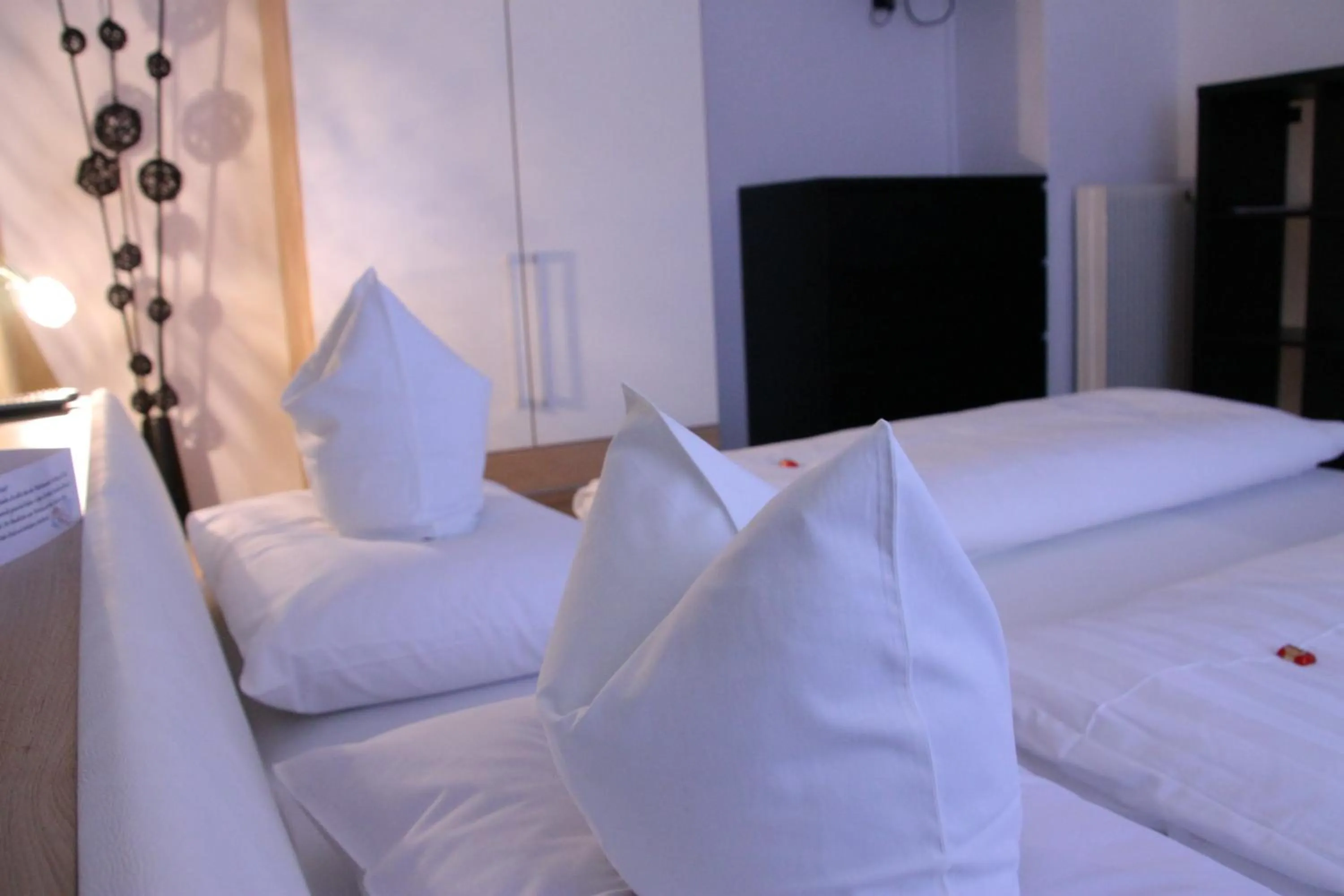 Photo of the whole room, Bed in Garni Brunnenhof