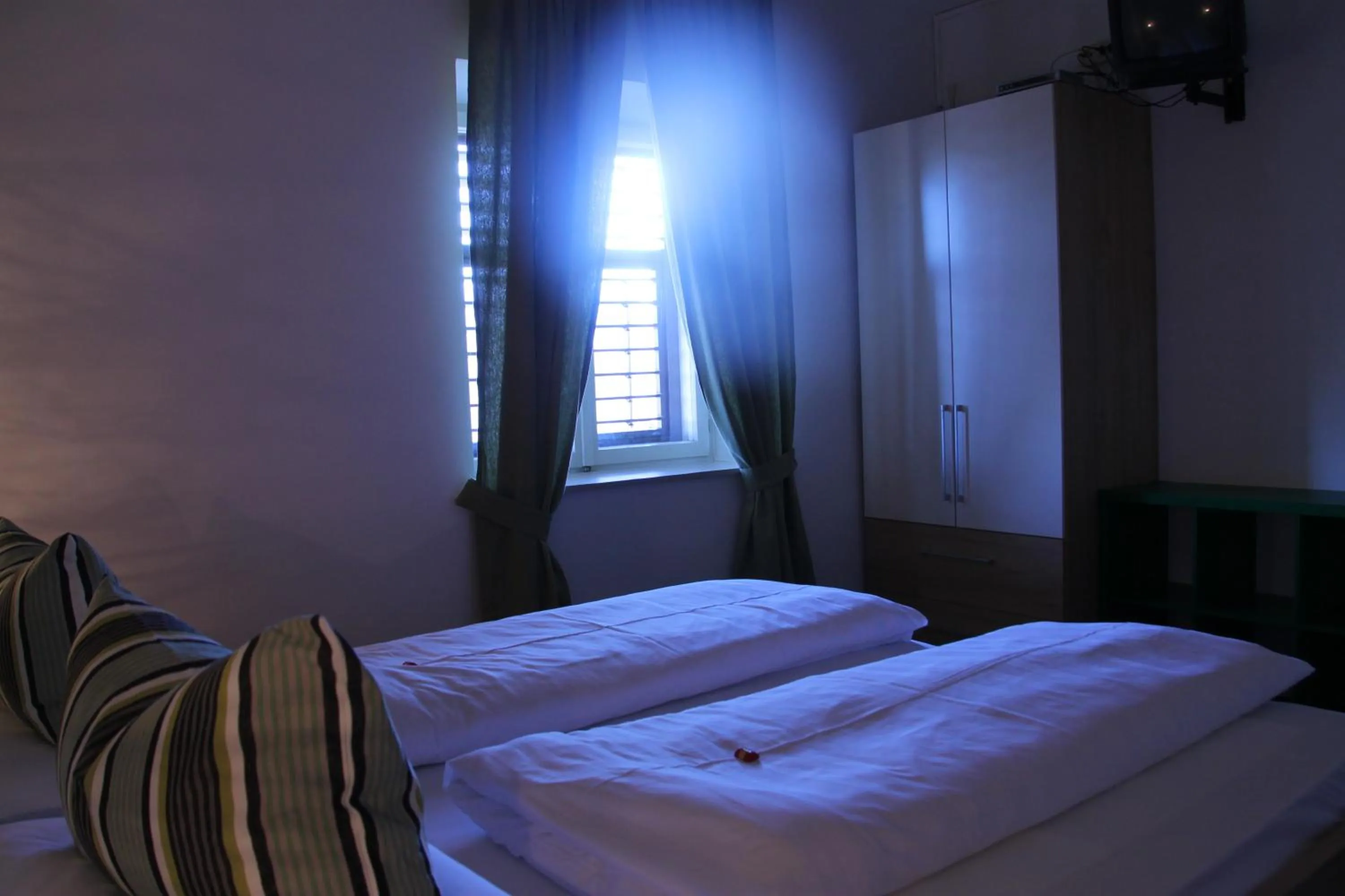 Photo of the whole room, Bed in Garni Brunnenhof