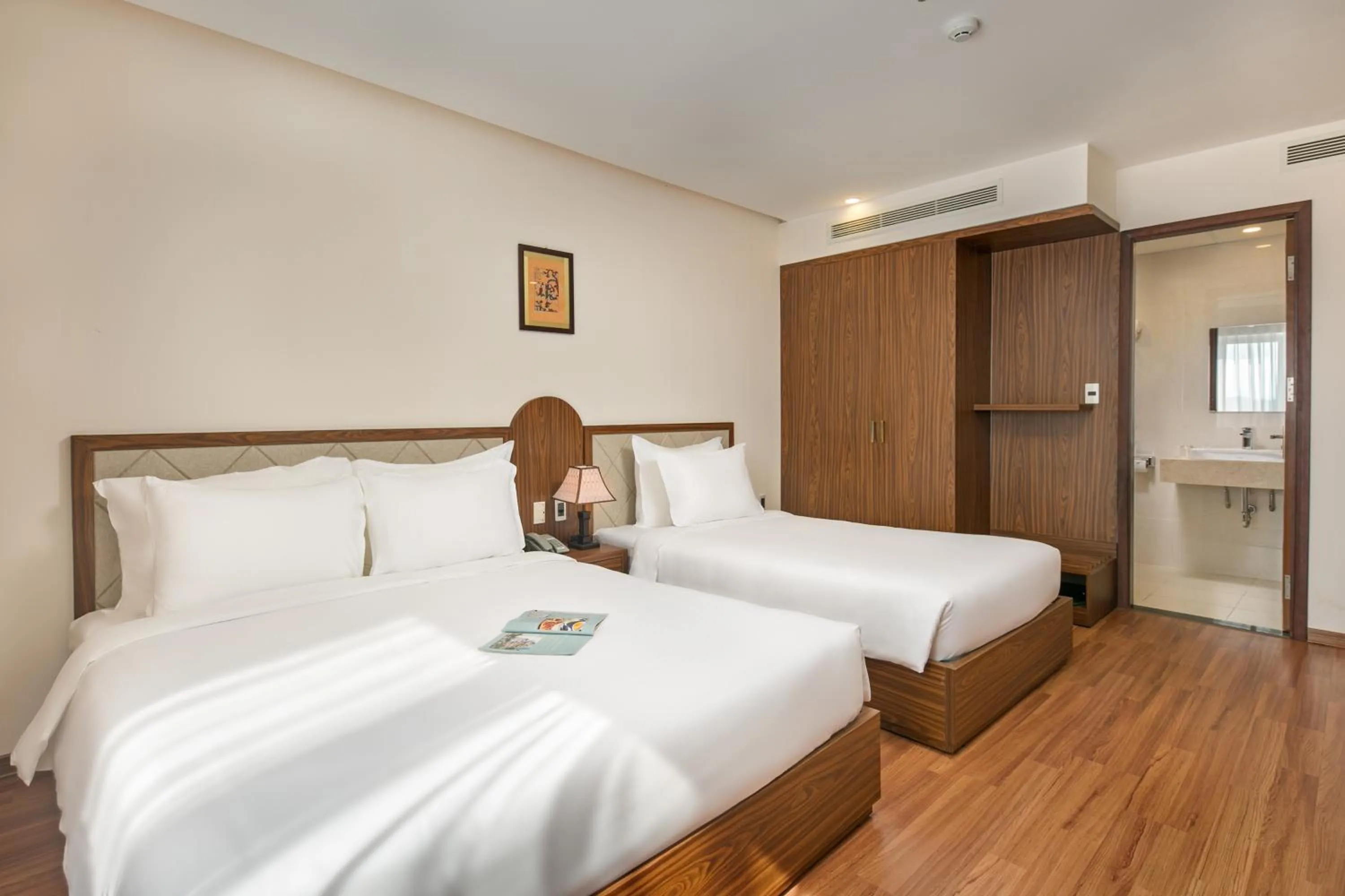 Bed in De Lamour Hotel Da Nang