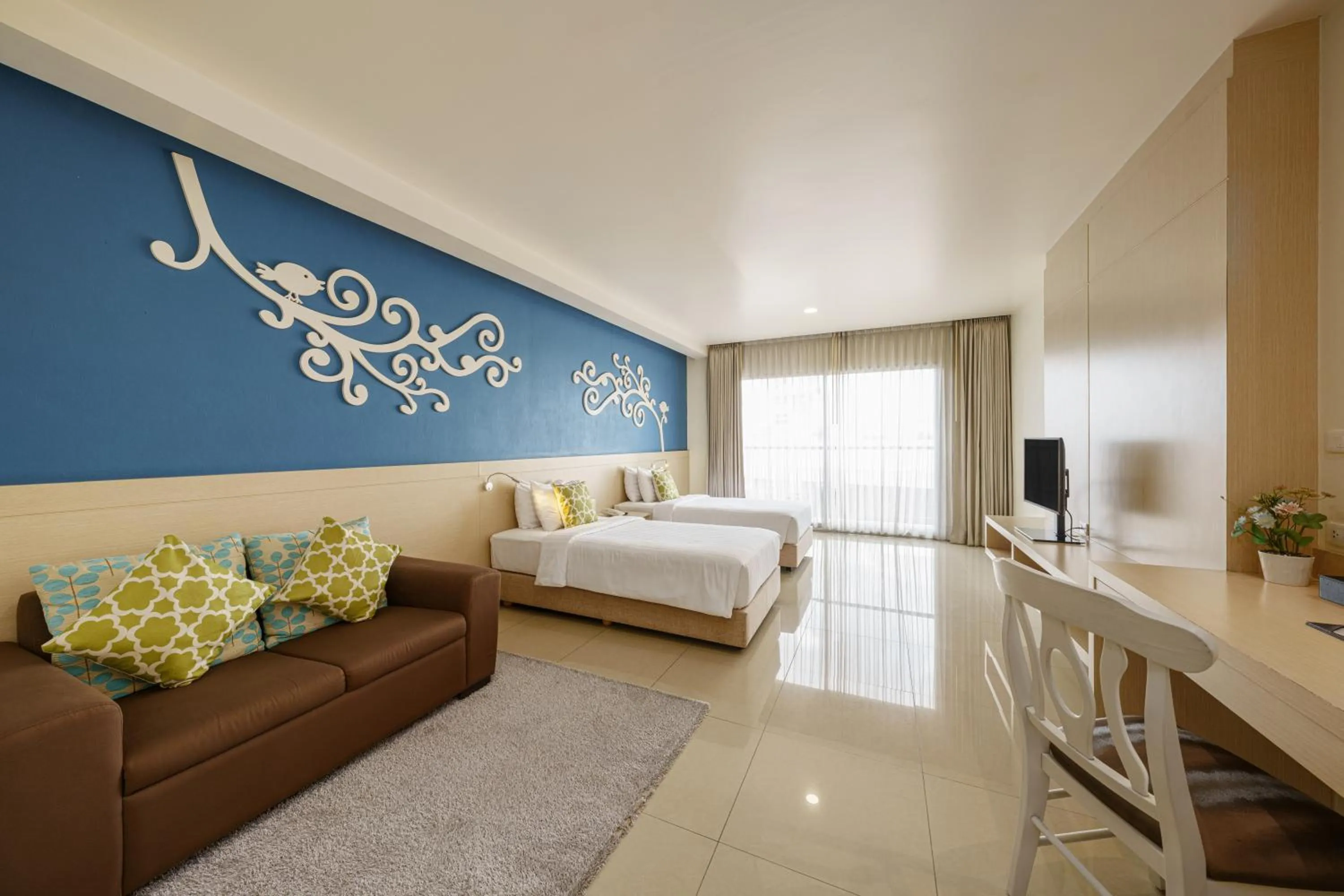 Bed in Jolly Suites&Spa Petkasem