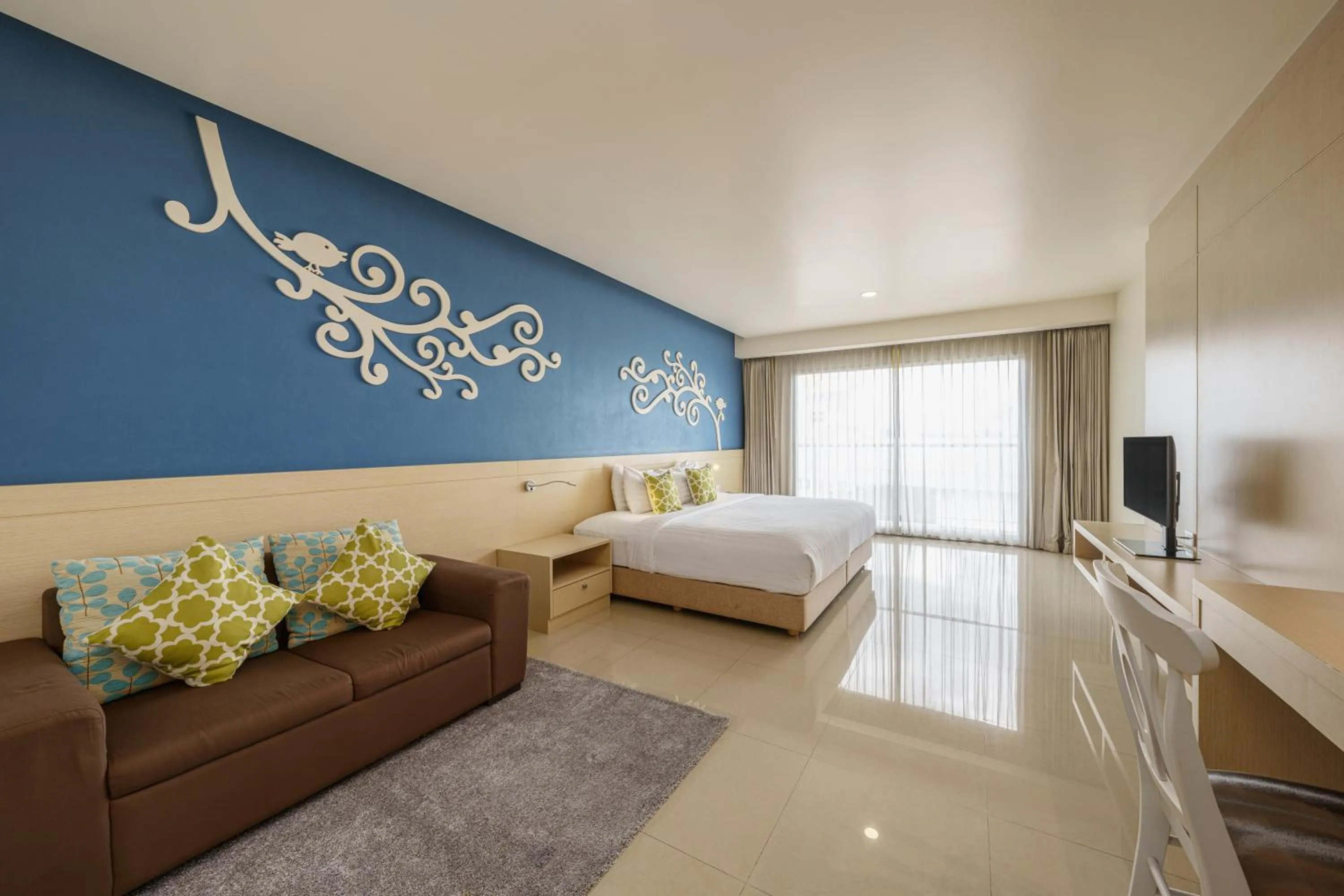 Bed in Jolly Suites&Spa Petkasem