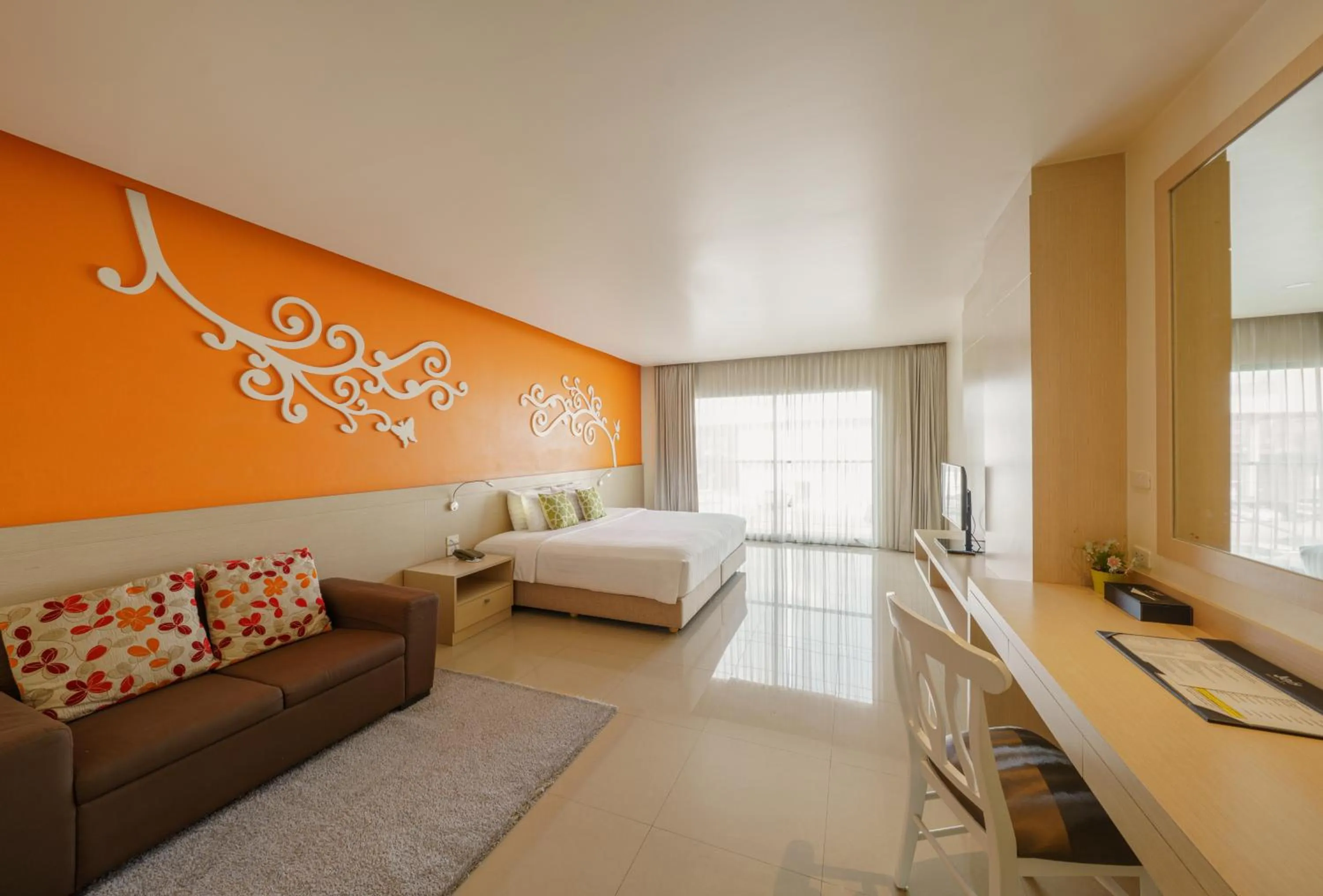 Bed in Jolly Suites&Spa Petkasem