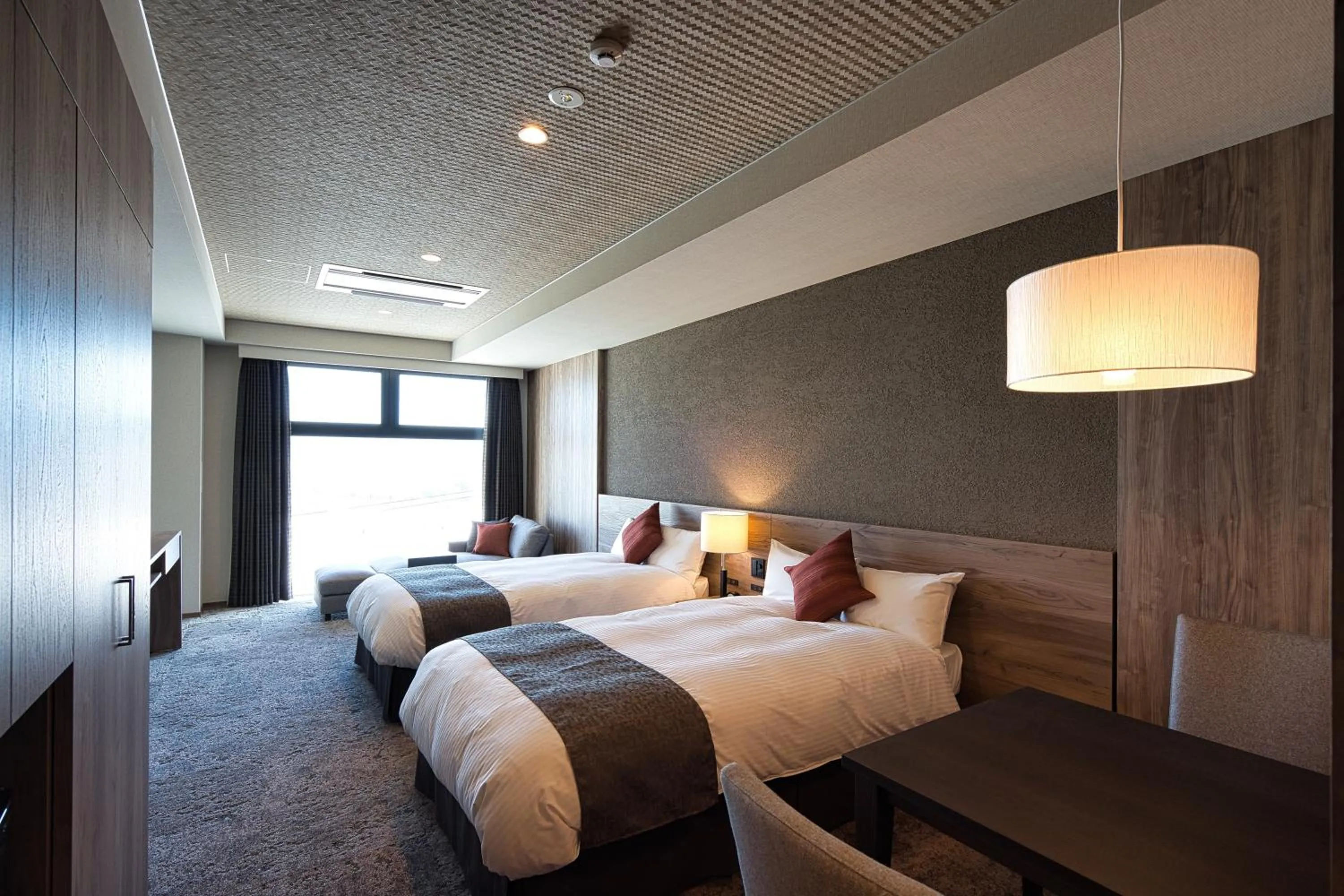 Photo of the whole room, Bed in Winery Hotel and Condominium HITOHANA