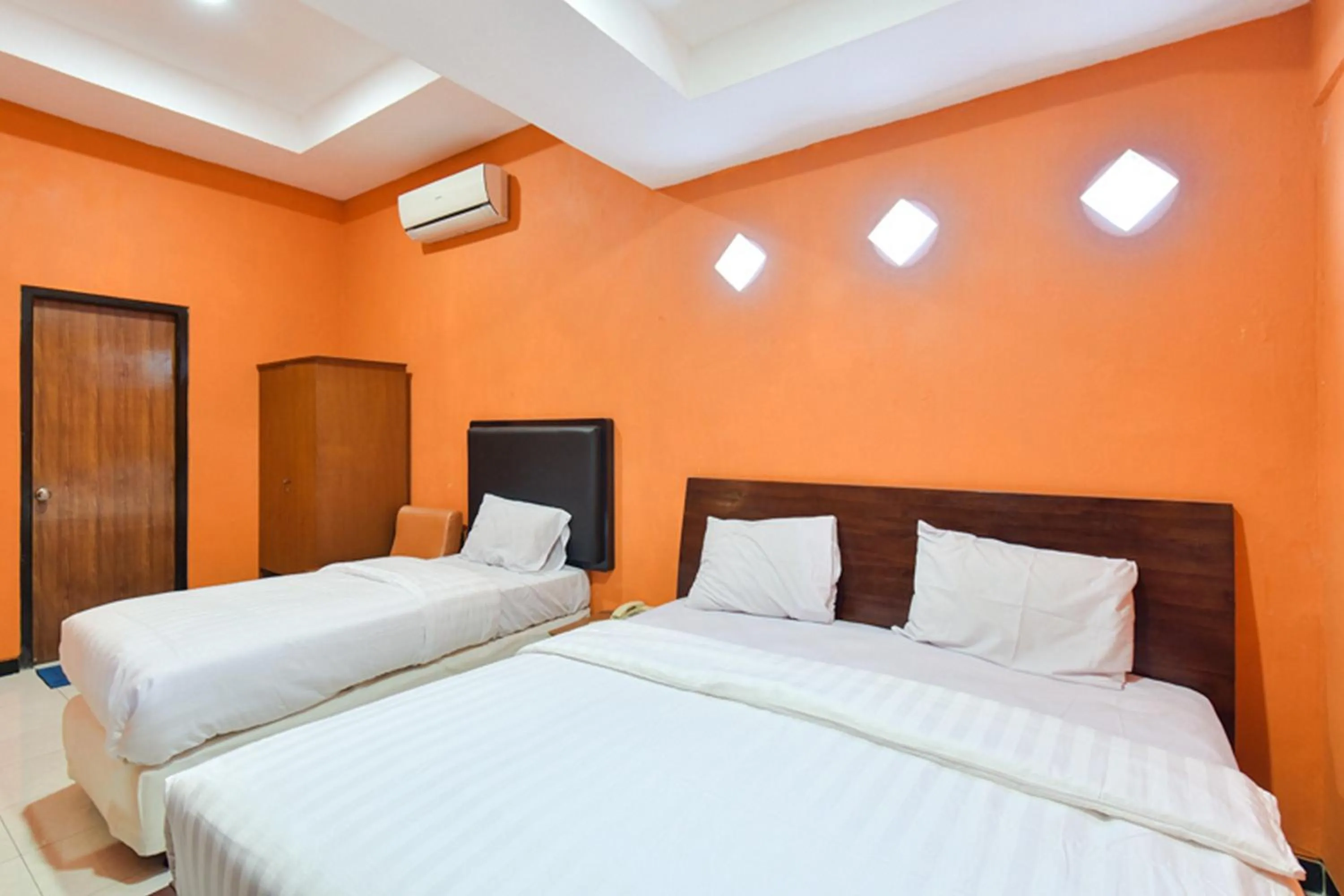 Bed in Sekar Ayu Hotel Malioboro Mitra RedDoorz