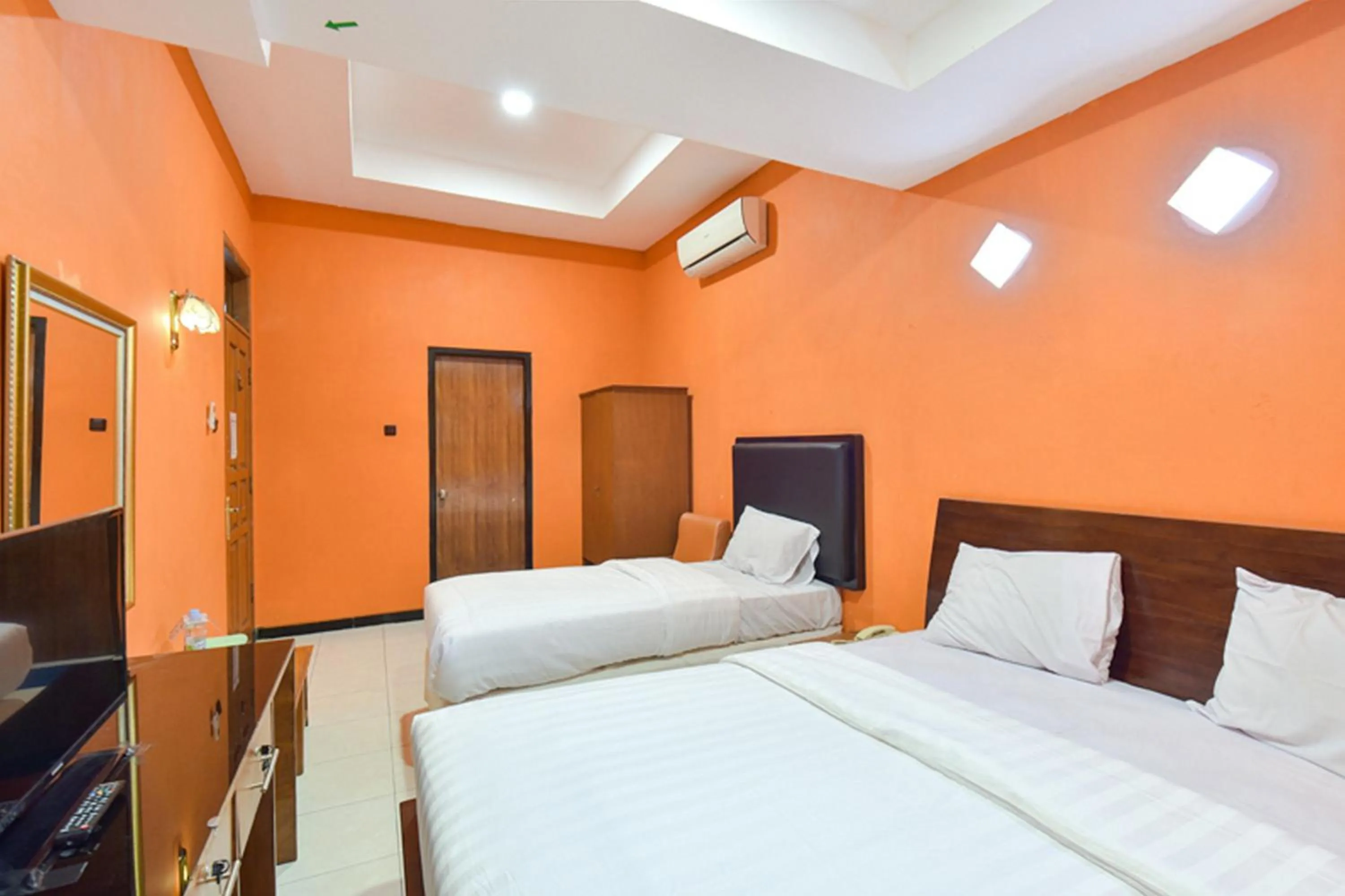 Bed in Sekar Ayu Hotel Malioboro Mitra RedDoorz