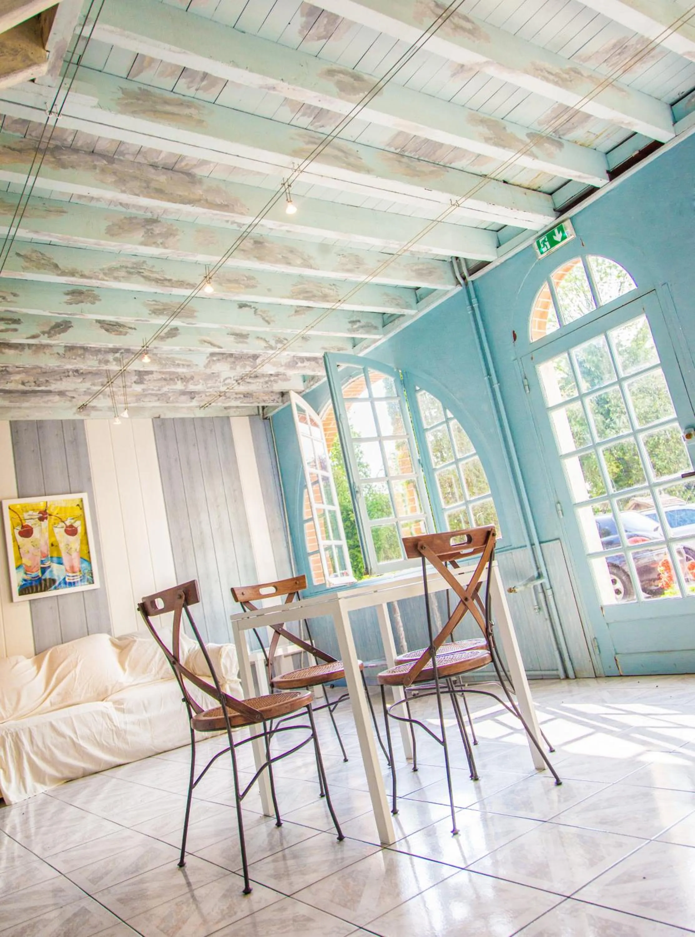 Communal lounge/ TV room in Logis Hôtel Restaurant L'Ile de Sées