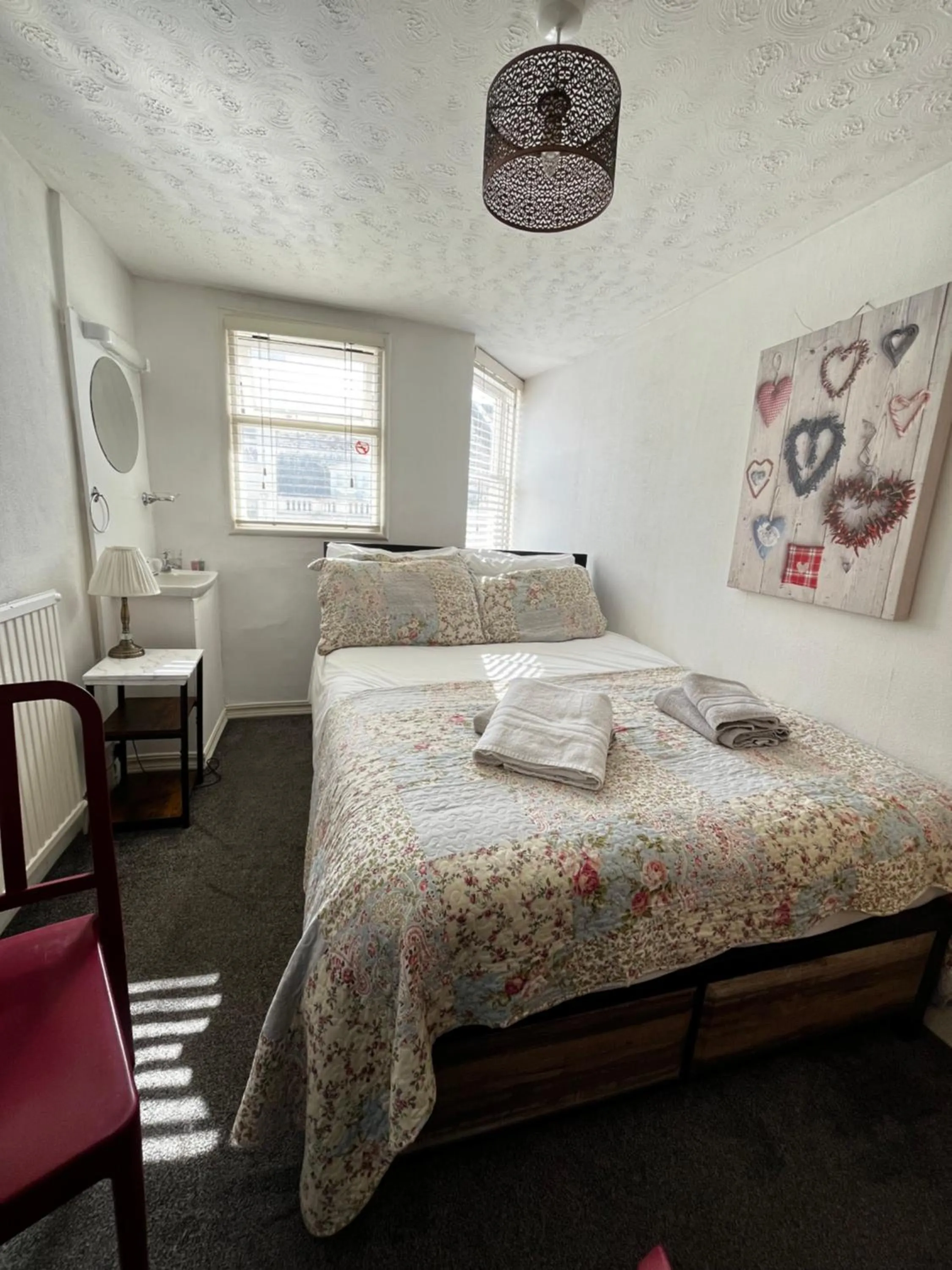 Bed in Relax Inn Guest House