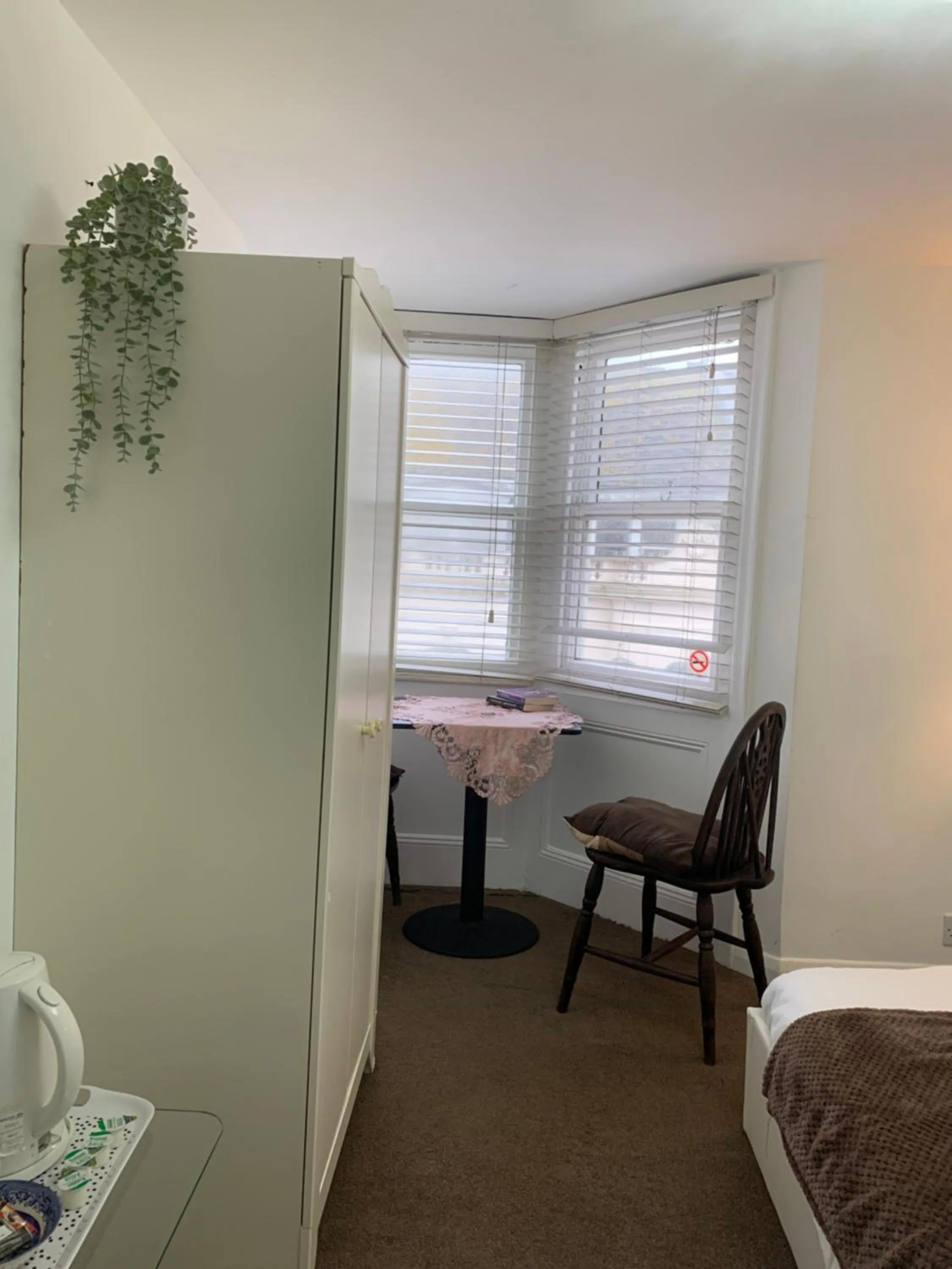 Seating area, Bed in Relax Inn Guest House