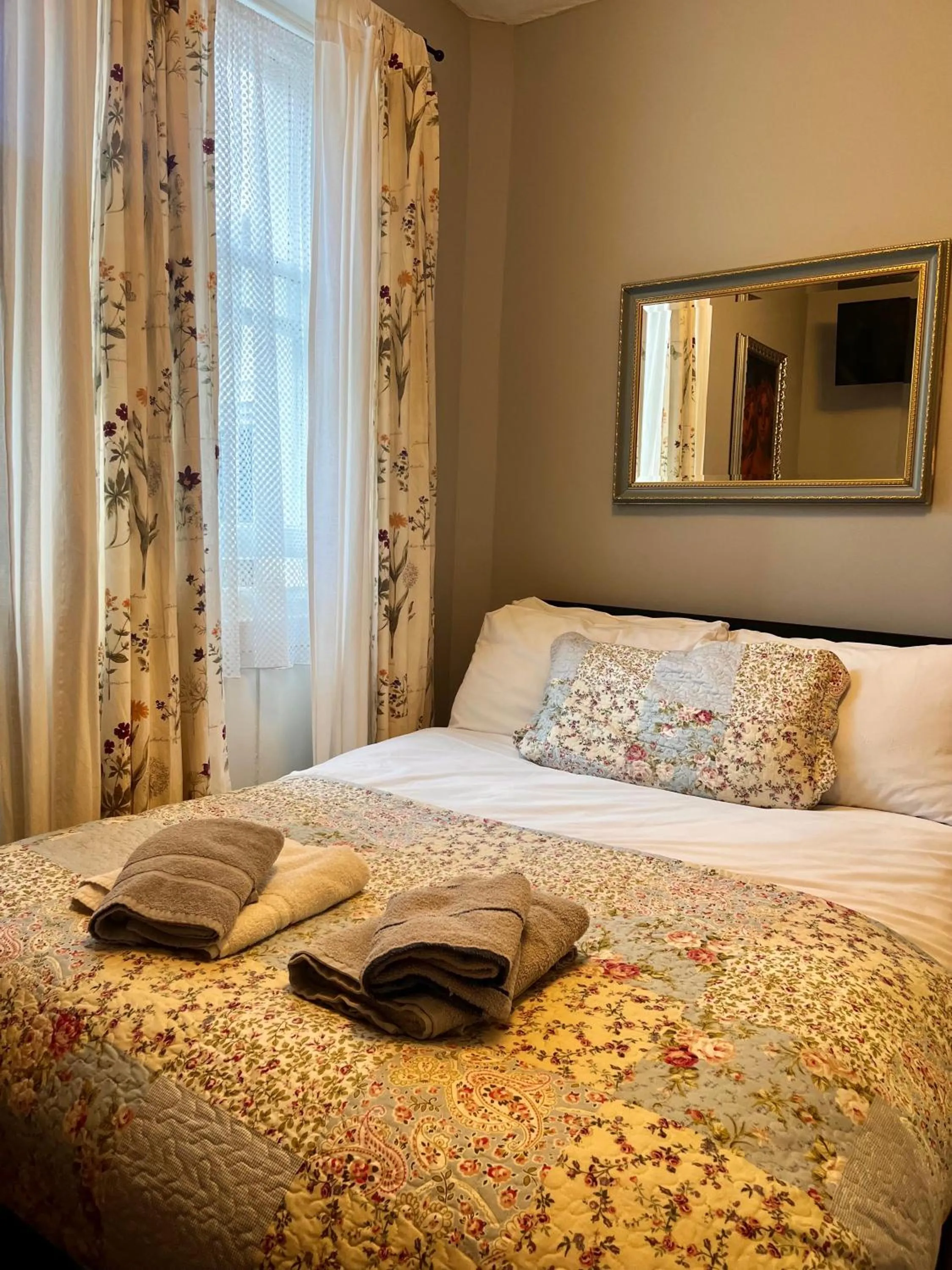 Bed in Relax Inn Guest House