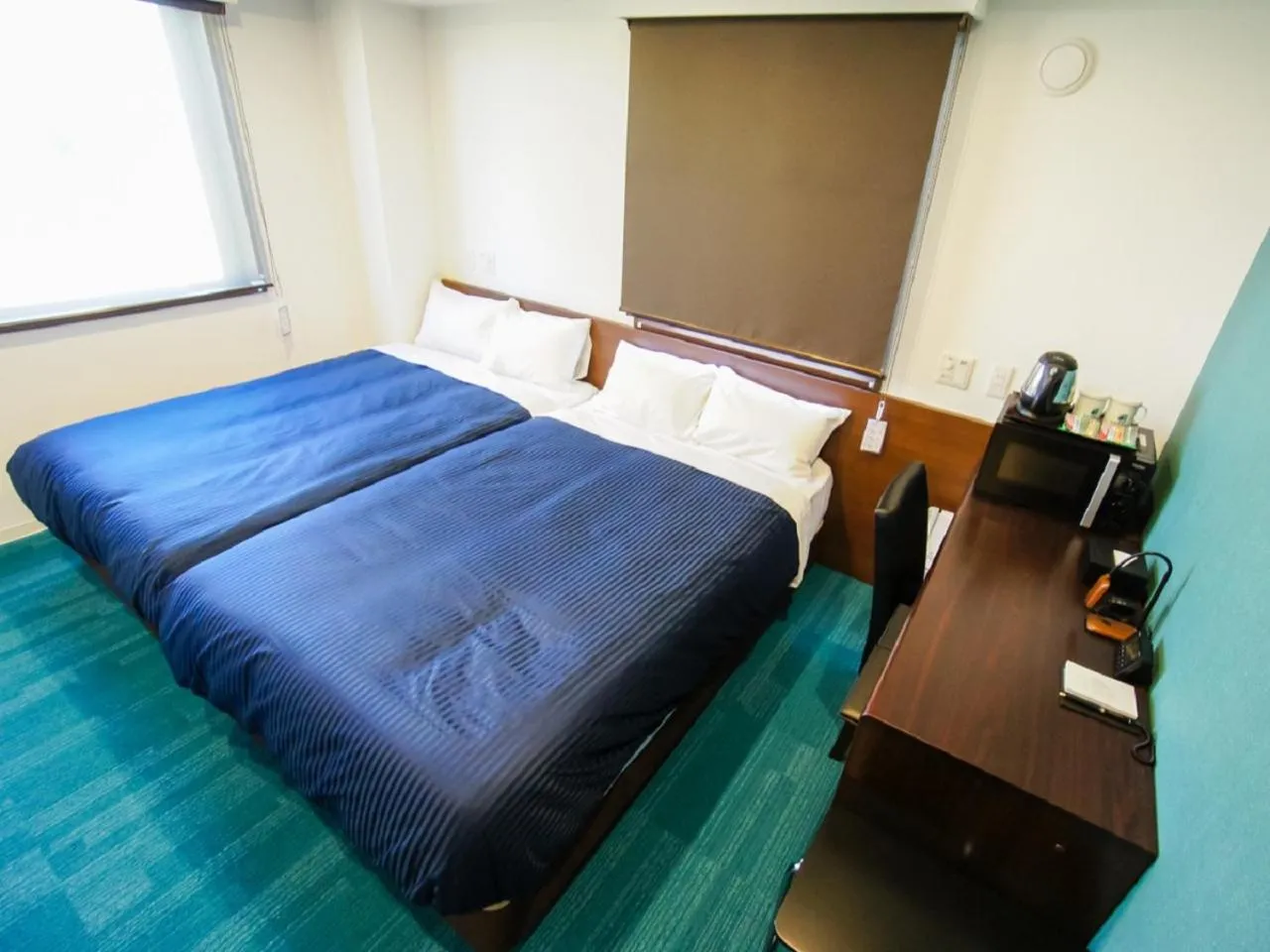 Bed in HOTEL LiVEMAX Gifu Hashima Ekimae