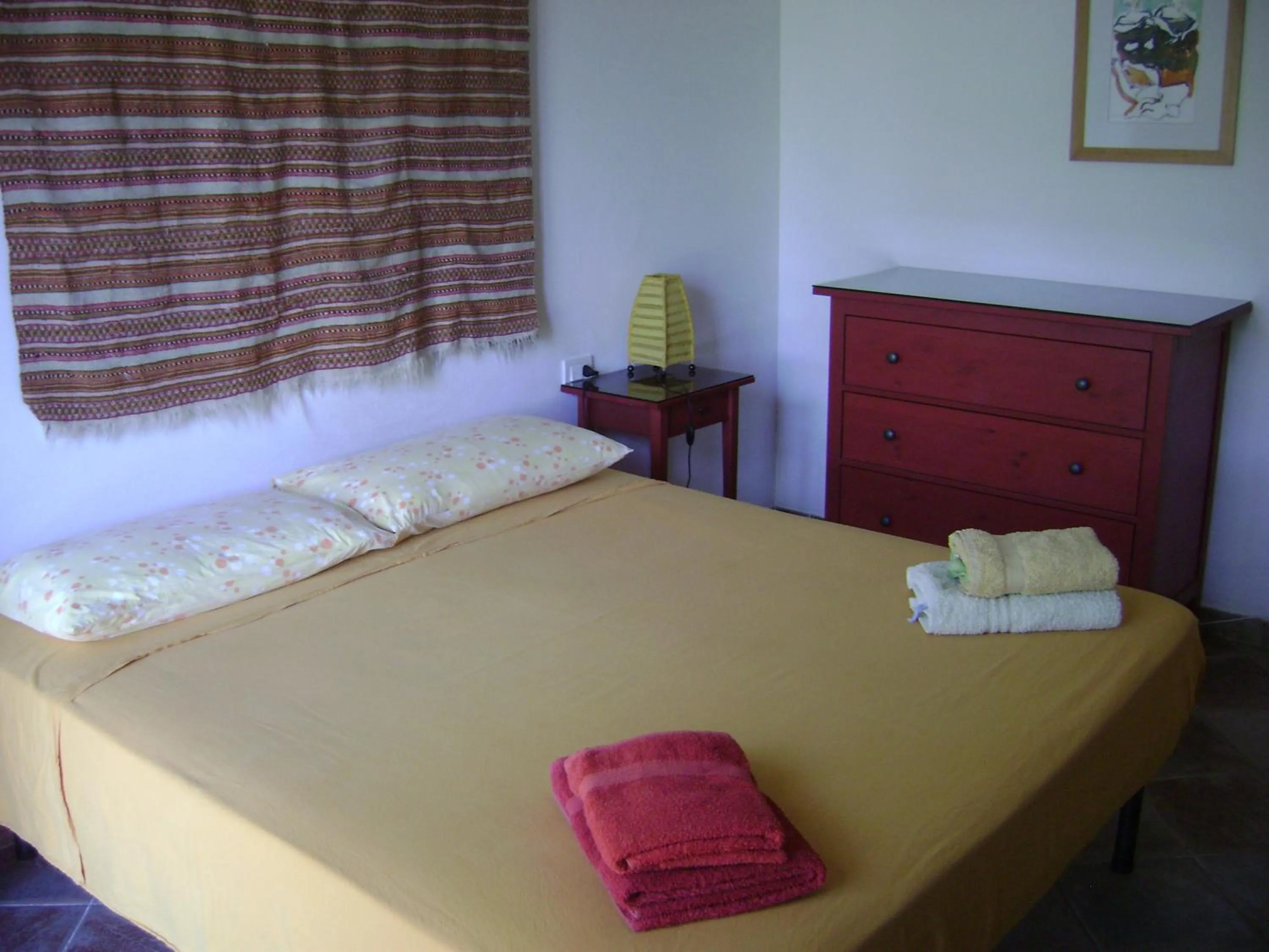 Bed in Hotel Sandalyon