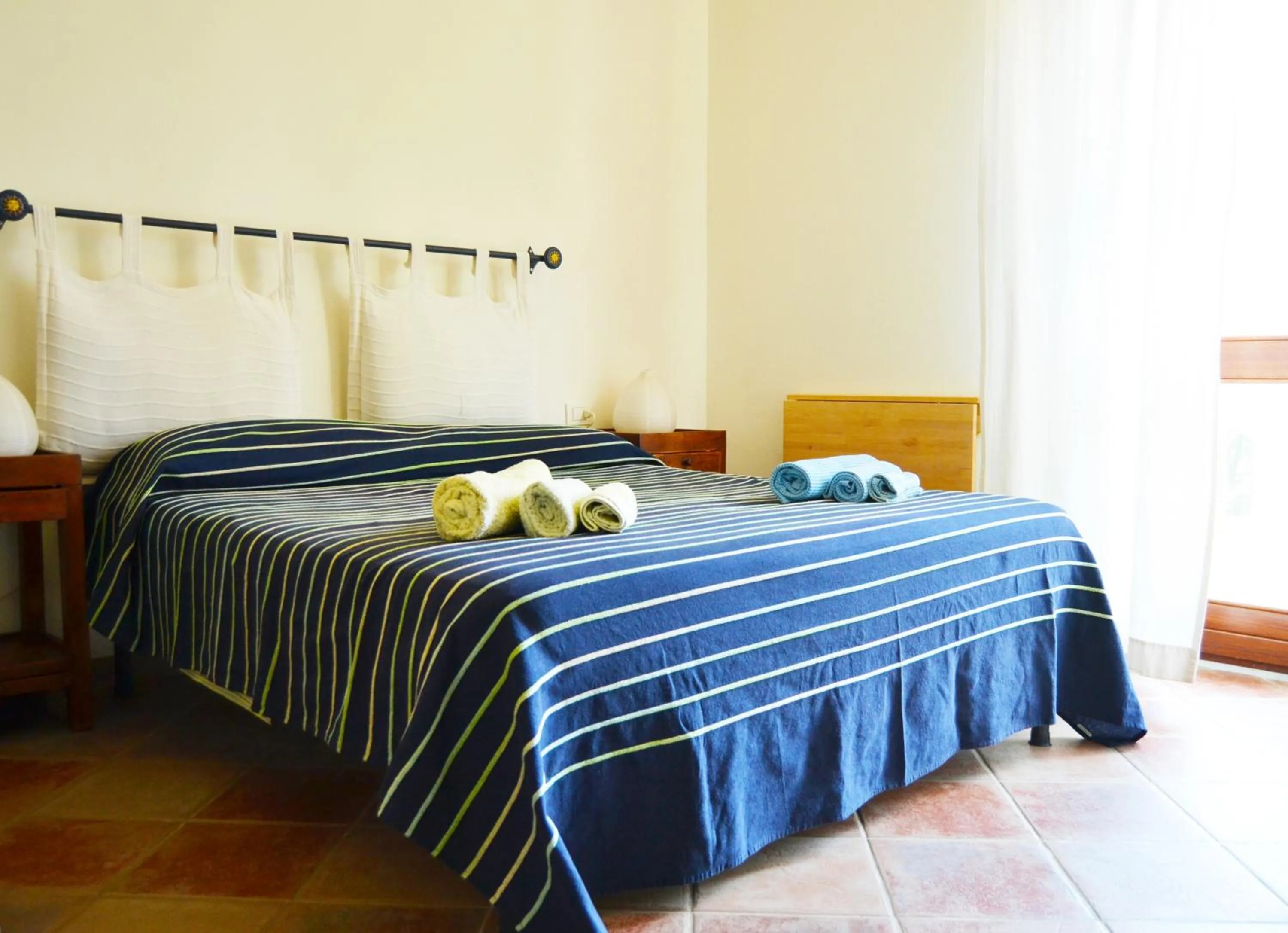 Bed in Hotel Sandalyon