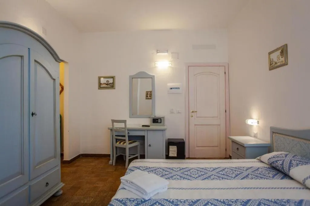 Bed in Hotel Sandalyon