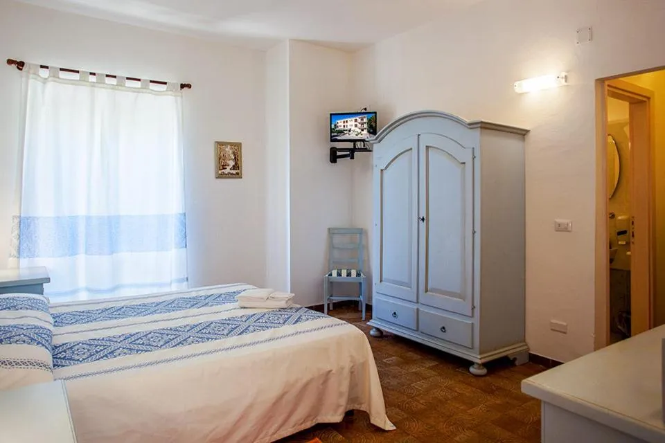 Bed in Hotel Sandalyon