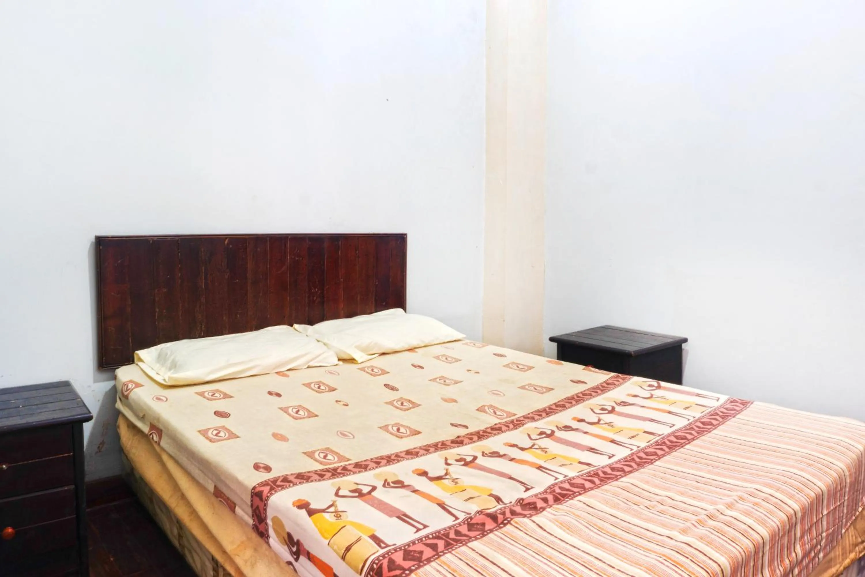Bed in Apartment Wisma Tobana II