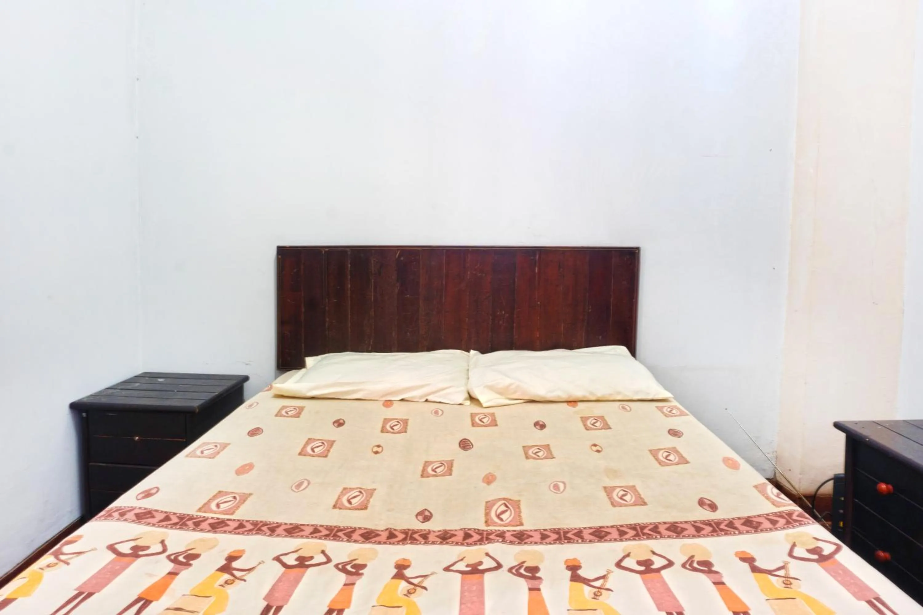 Bed in Apartment Wisma Tobana II