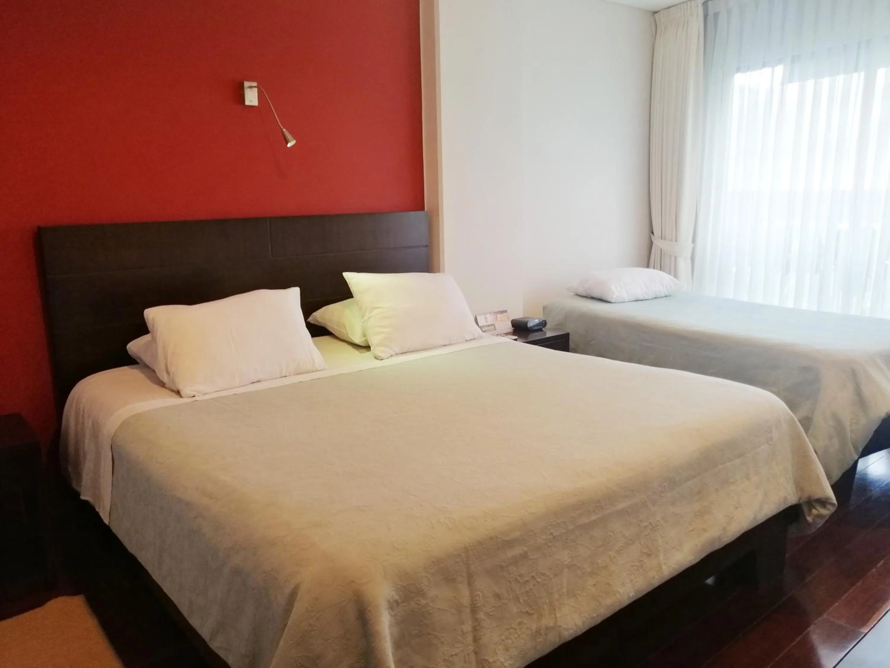 Bed in Apartasuites BellHouse Bogotá