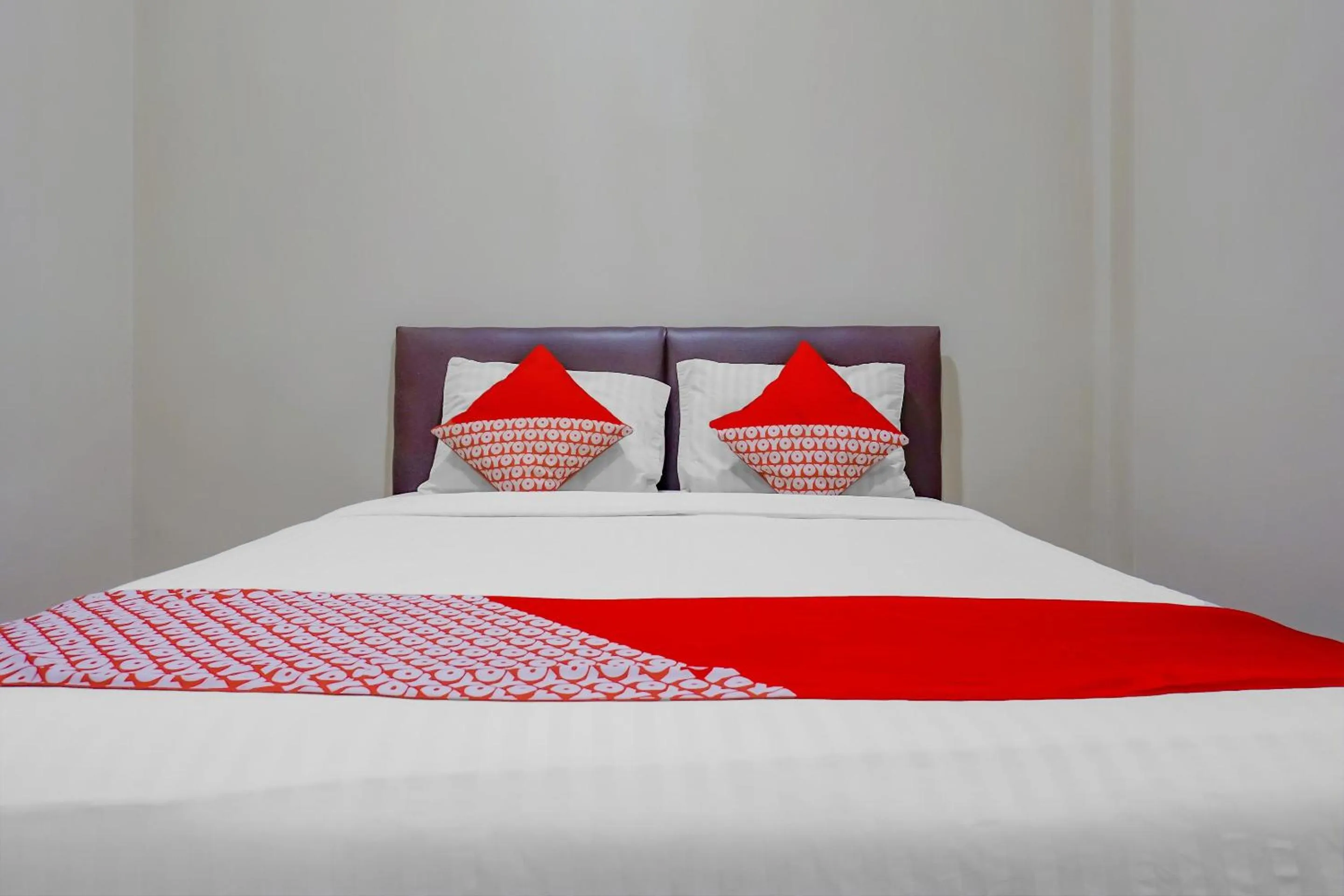 Bedroom in OYO 117 Blueberry Homestay