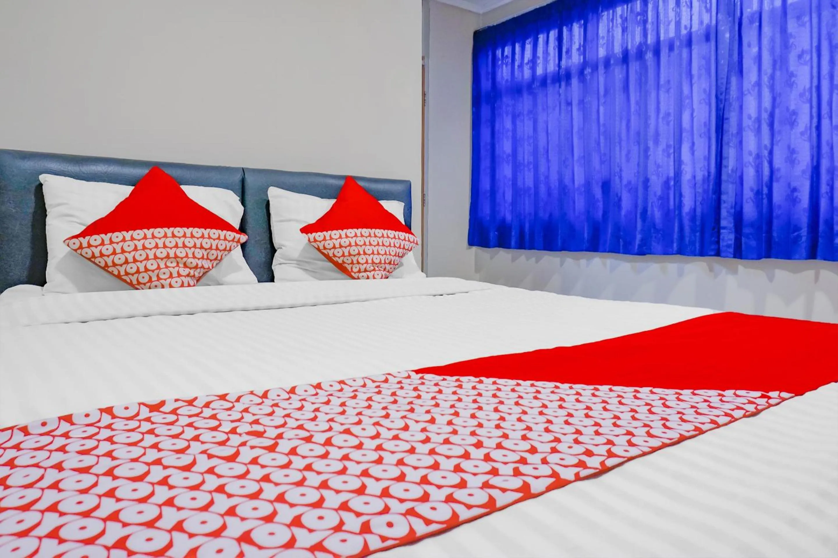Bed in OYO 117 Blueberry Homestay