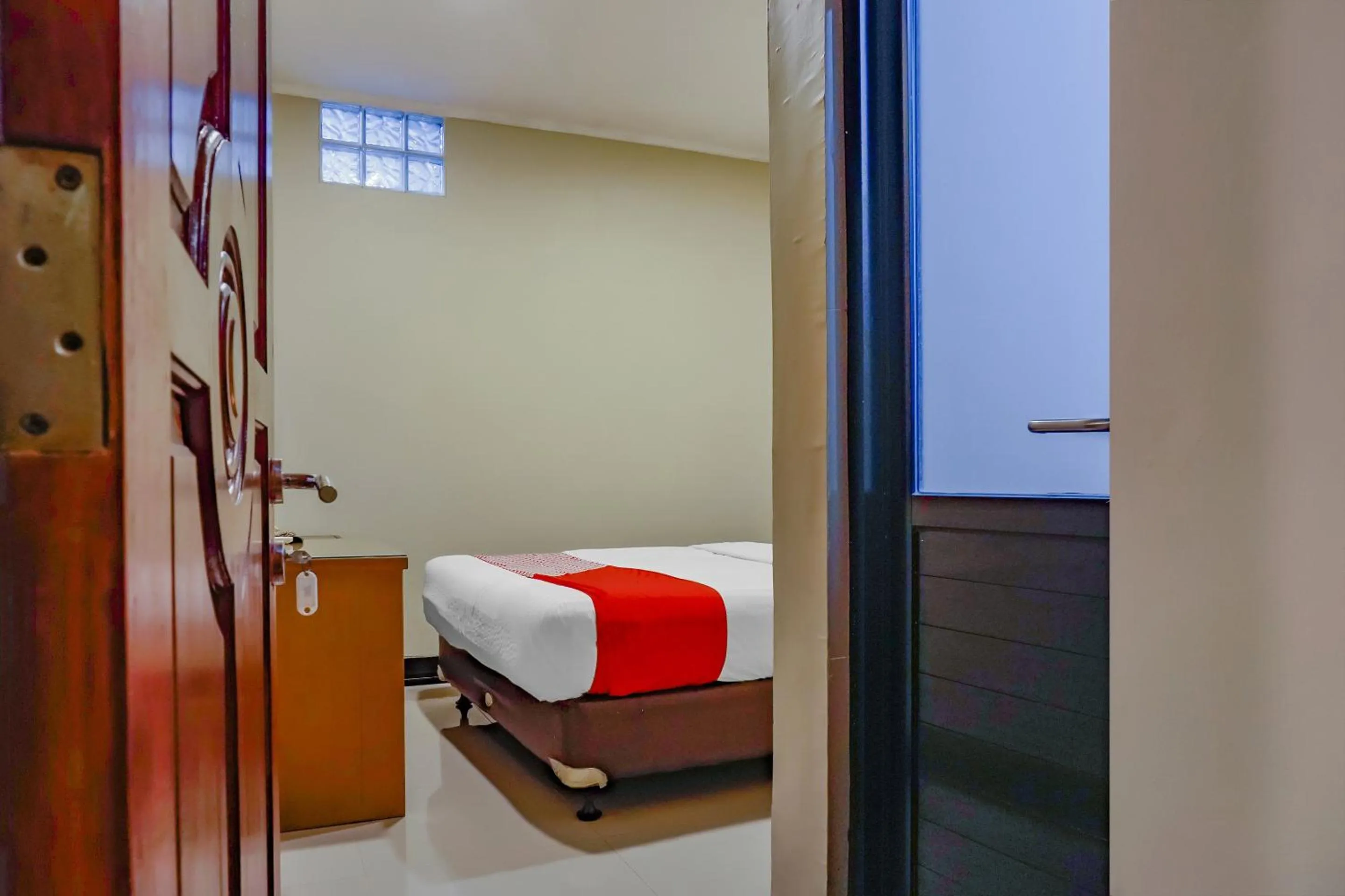 Bedroom in OYO 117 Blueberry Homestay