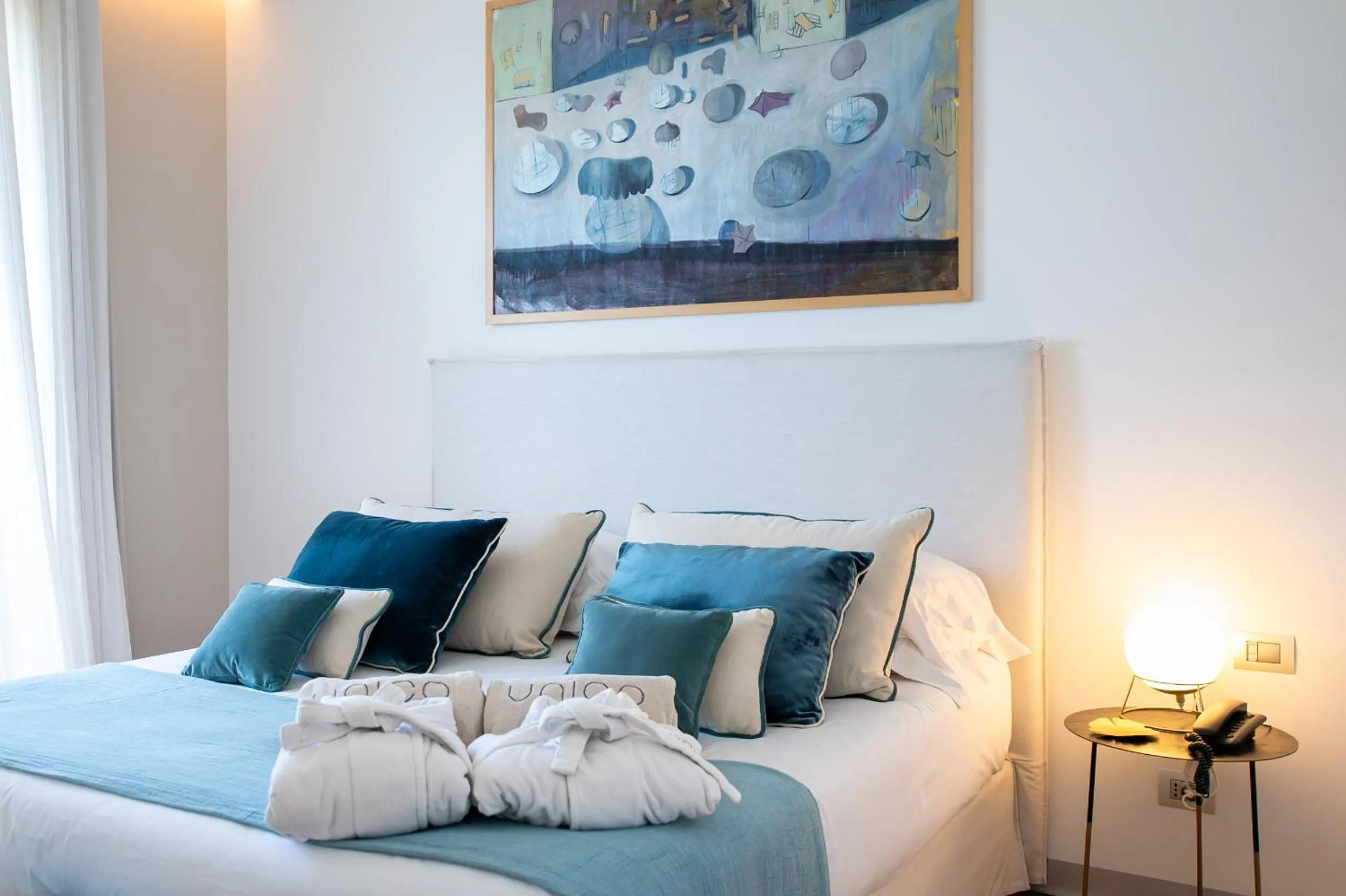 Bed in Unìco Boutique Hotel d'Arte