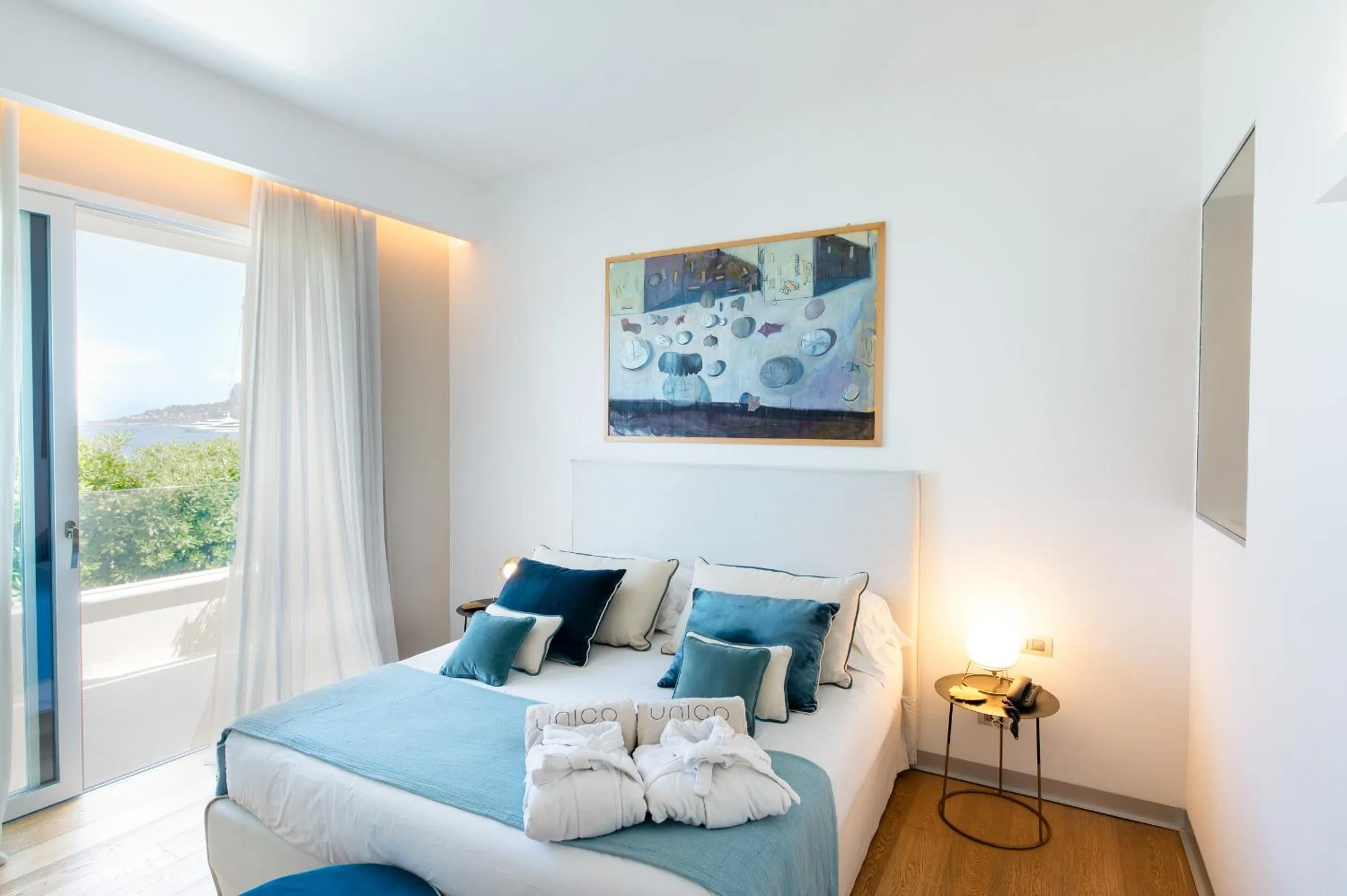 Bed in Unìco Boutique Hotel d'Arte