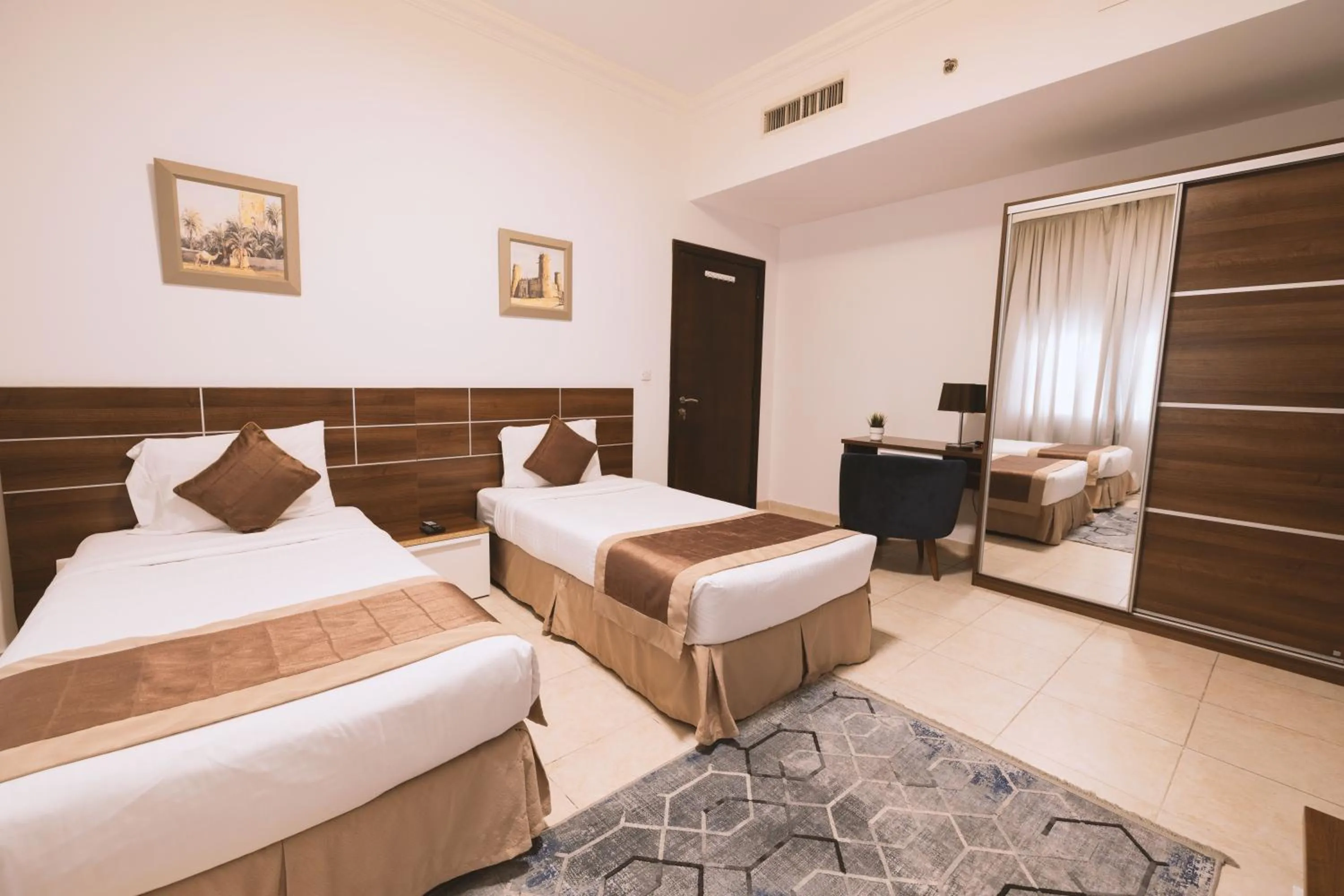 Bedroom in Magnum Hotel & Suites West Bay