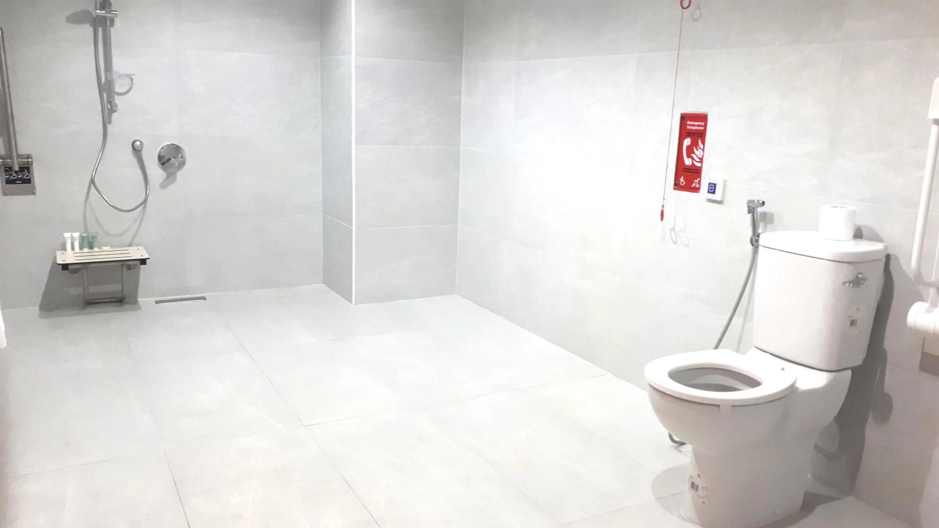 Bathroom in Magnum Hotel & Suites West Bay