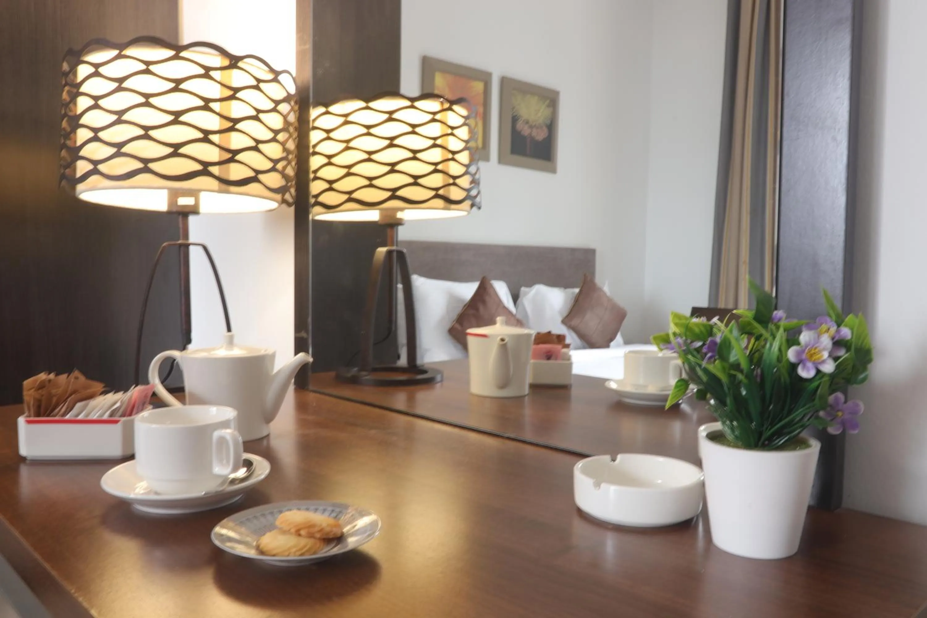 Bedroom in Magnum Hotel & Suites West Bay