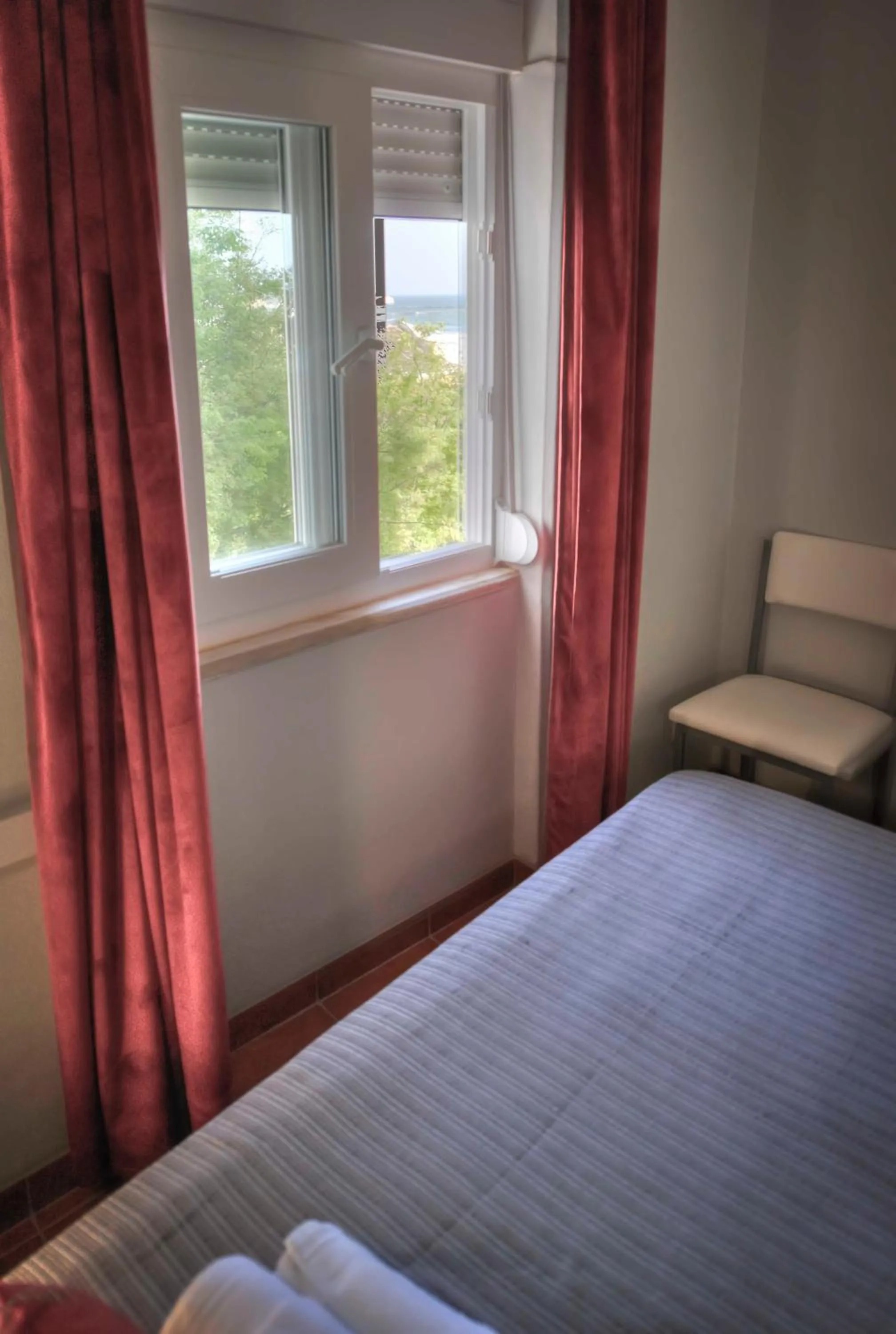 Bedroom, Bed in Apartamentos Belo Horizonte