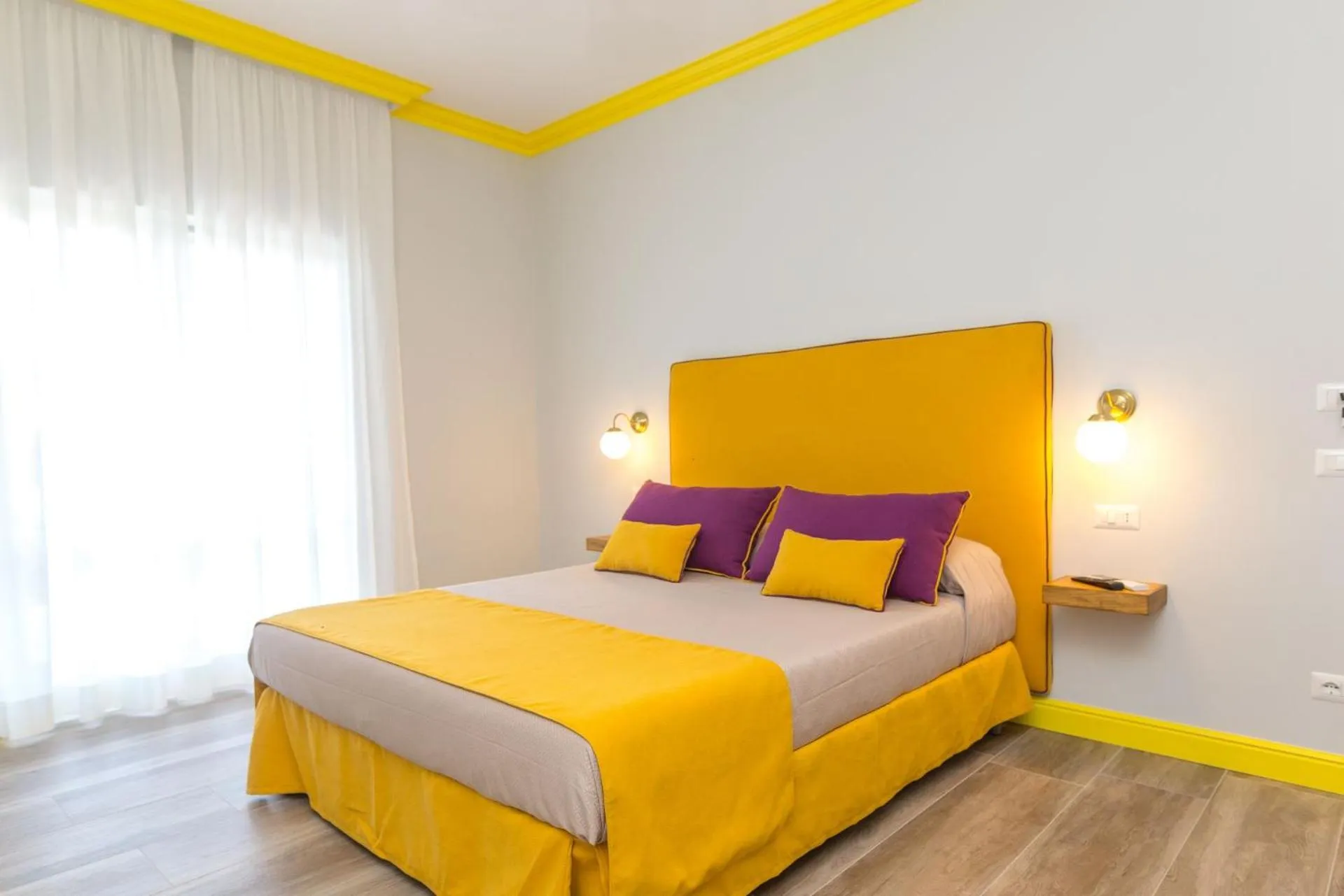 Bed in Sorrento Pool&Suites