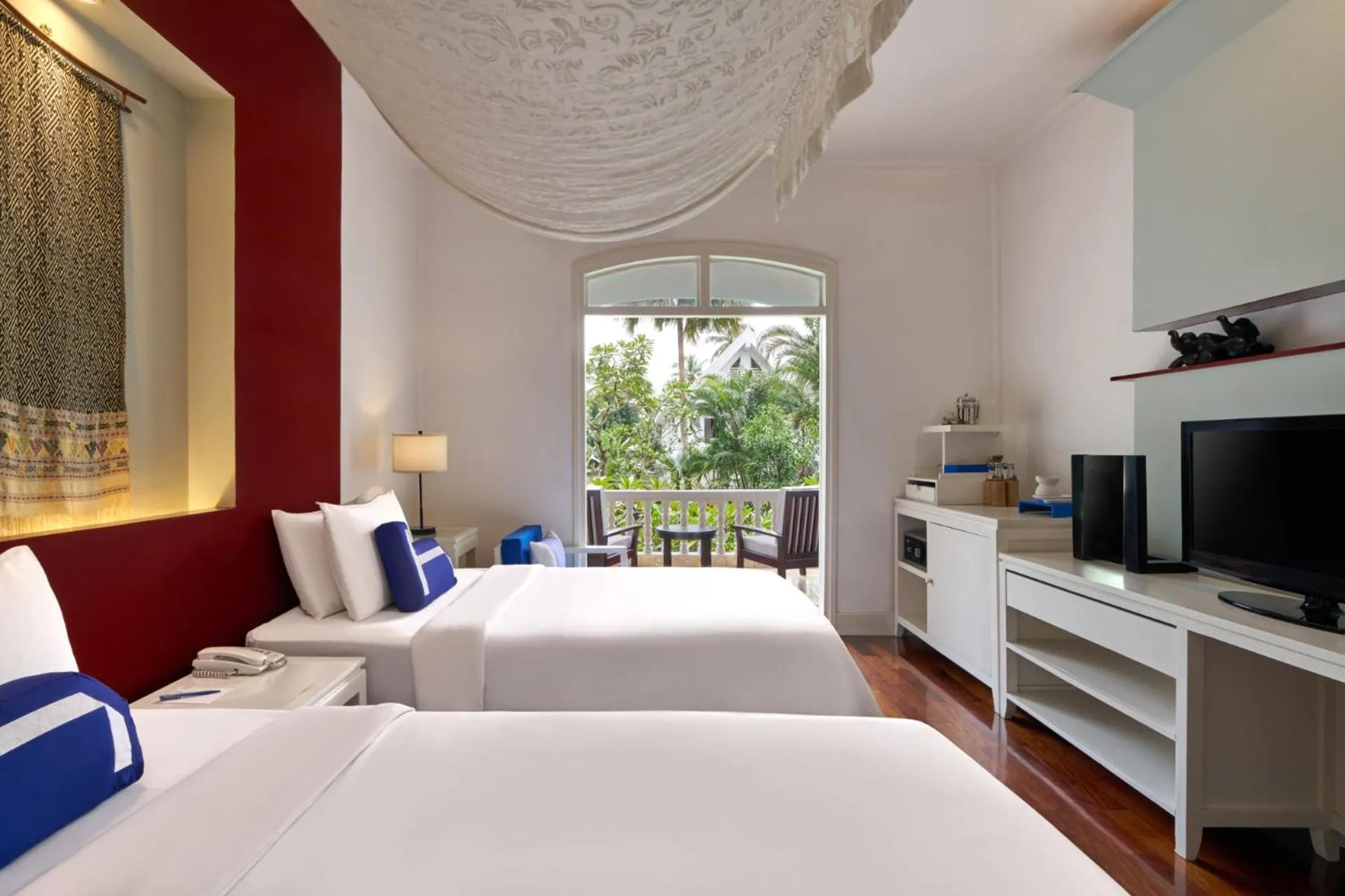 Bed in Homm Souvannaphoum Luang Prabang, part of Banyan Group