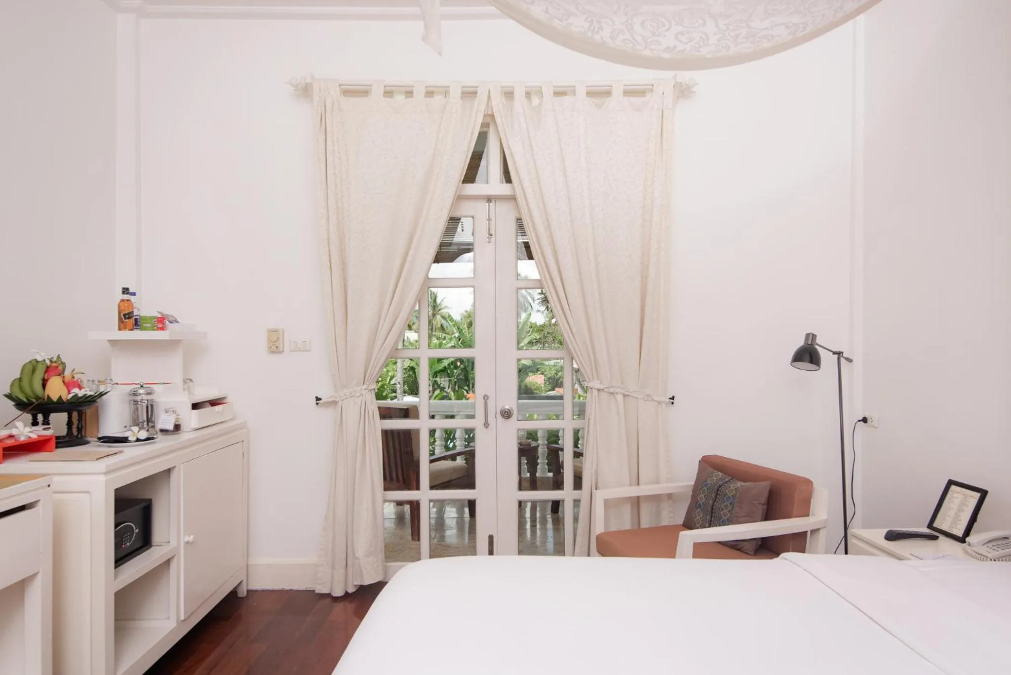 Bed in Homm Souvannaphoum Luang Prabang, part of Banyan Group