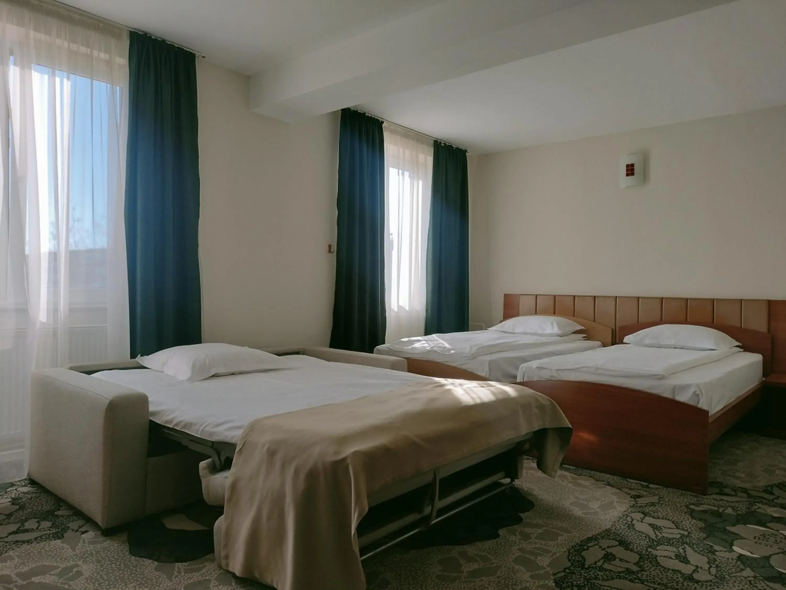Triple Room in Hotel Bistrita Triple Room in Hotel Bistrita