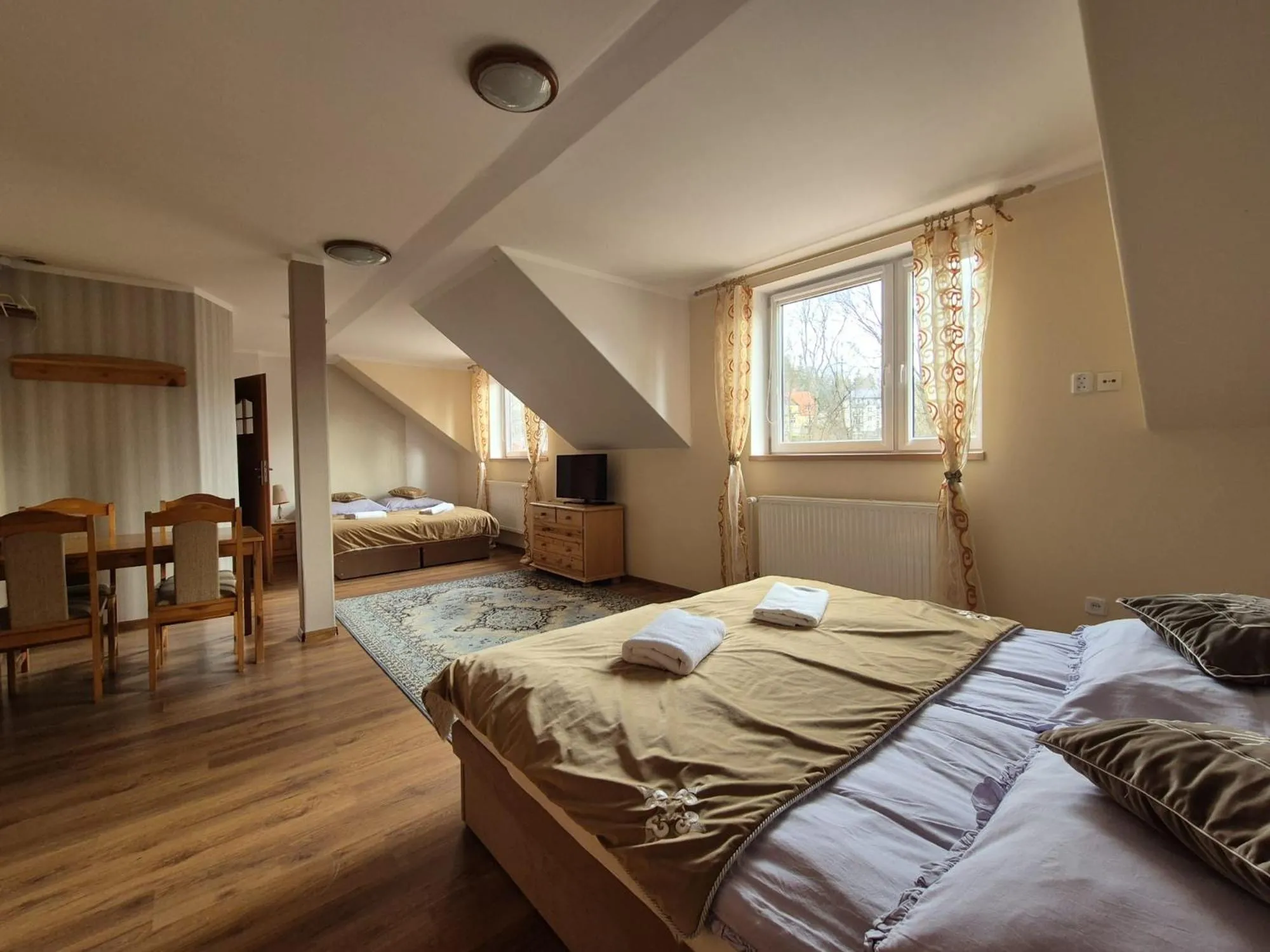 Photo of the whole room, Bed in Harmont Montis- dawna Zającówka- IDEALNA lokalizacja - leśna enklawa w centrum miasta! Sauna, masaże, zabiegi spa!