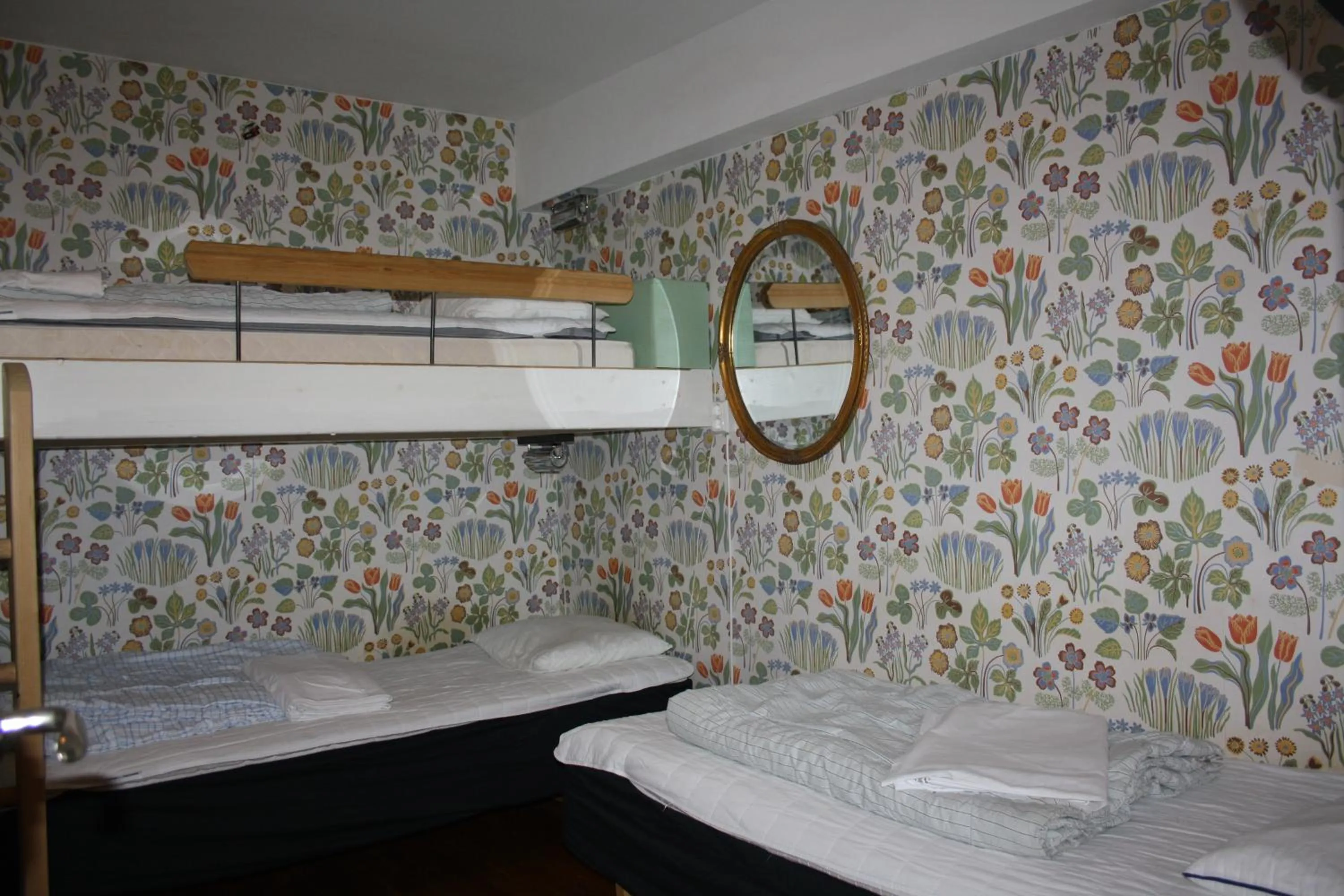 Basic Triple Room with Shared Bathroom in Hostel Bed & Breakfast